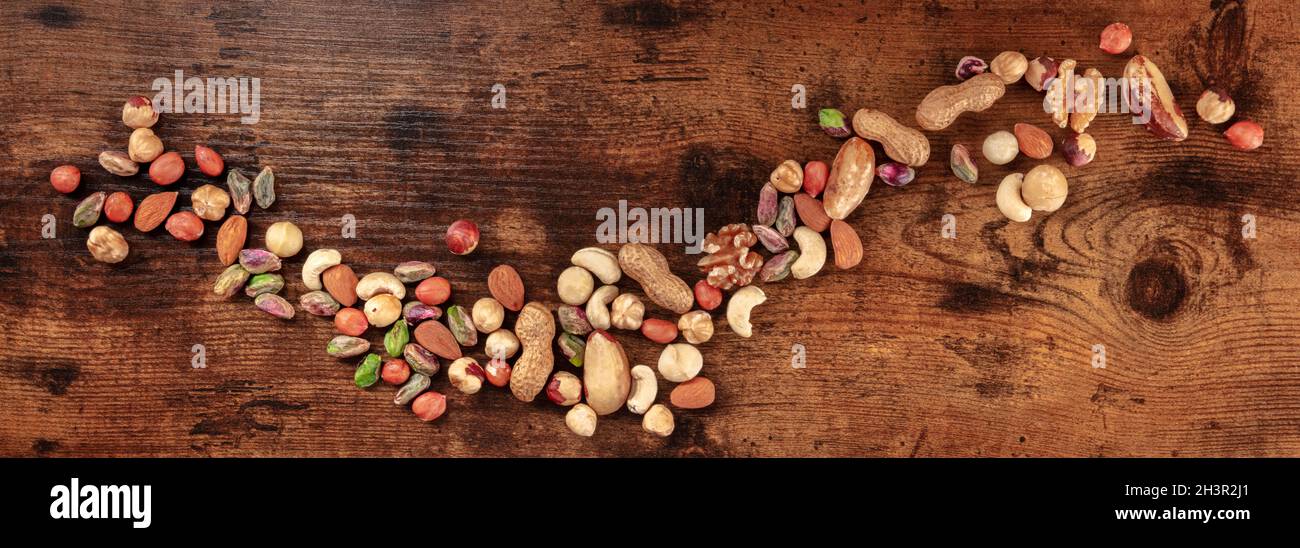 Nuts panorama. Many different nuts, shot from above Stock Photo
