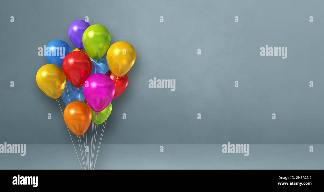 Colorful balloons bunch on a grey wall background. Horizontal banner ...