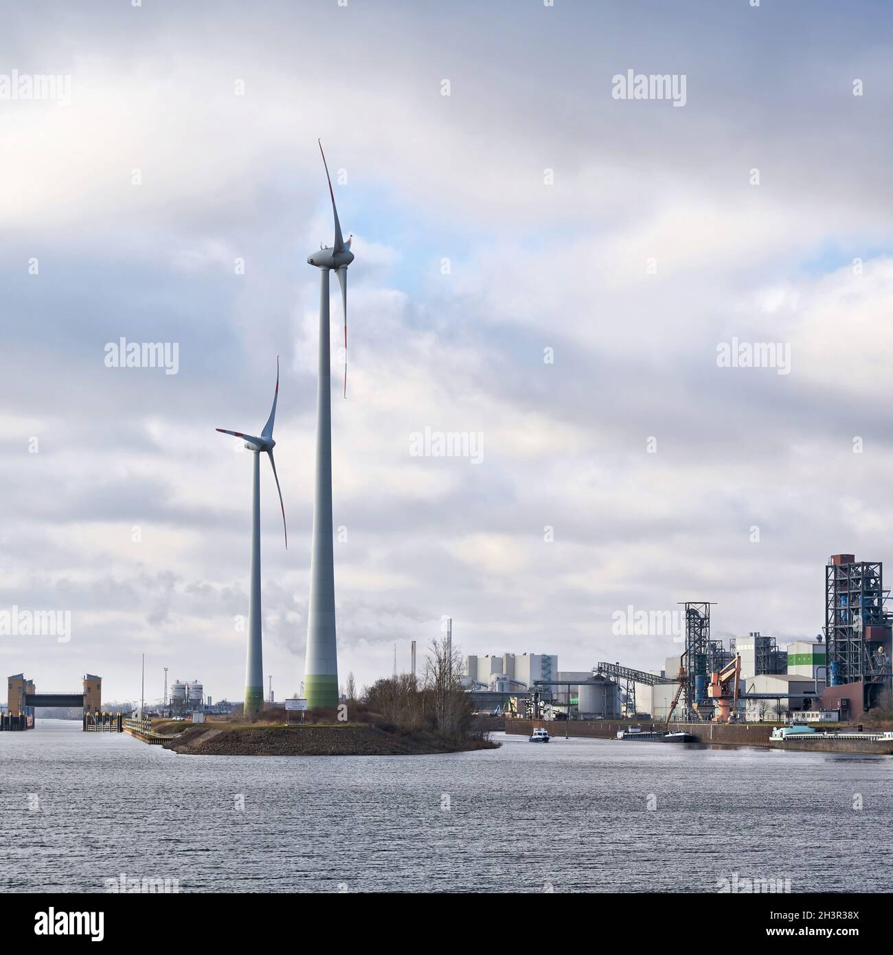 Industrial port of the city of Magdeburg with wind turbines of the company Enercon Stock Photo