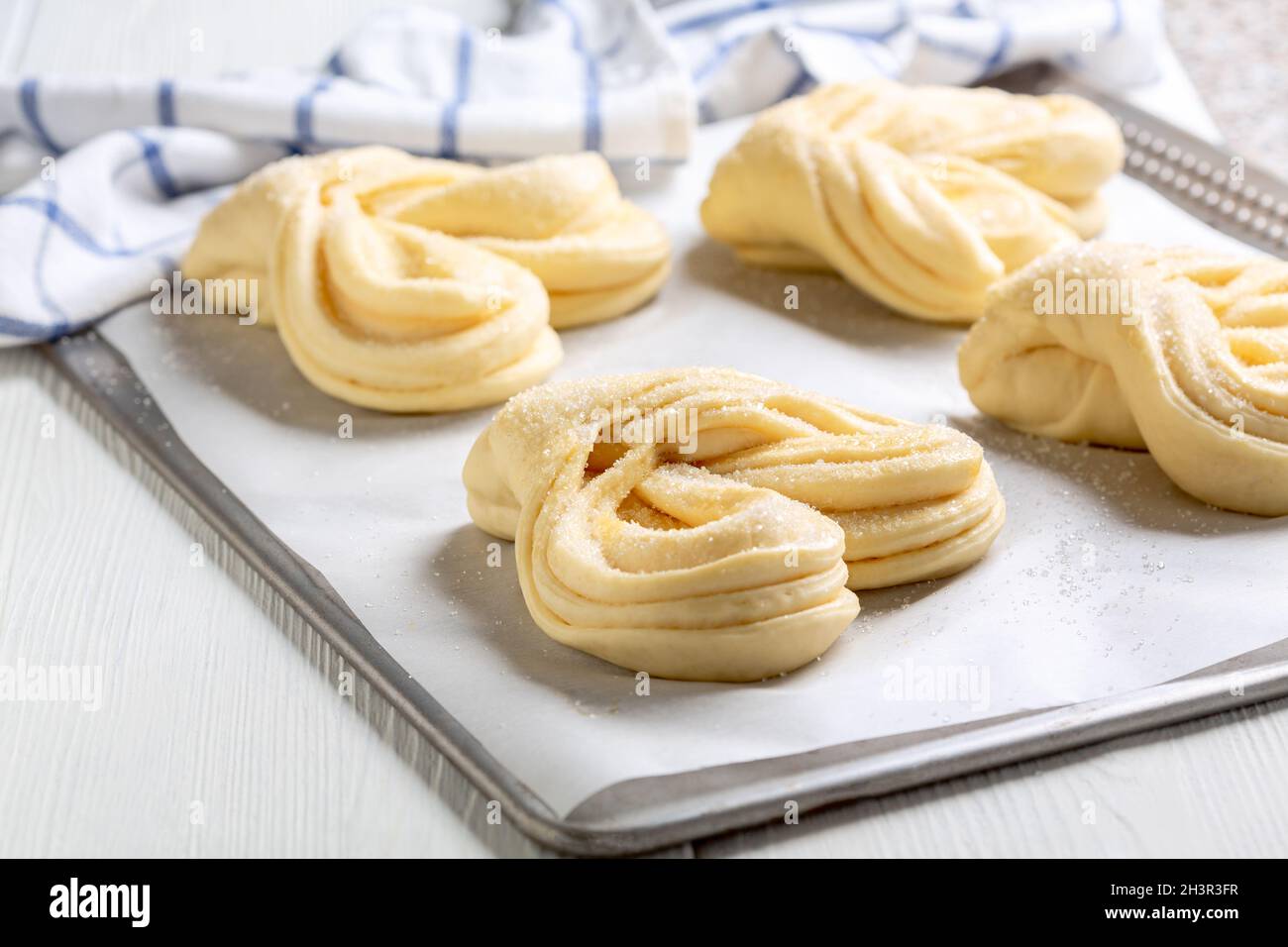 Process of making swirling buns. Stock Photo