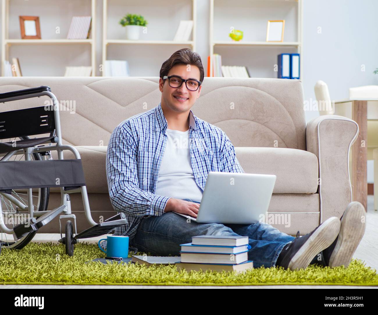 Young student studying at home Stock Photo - Alamy