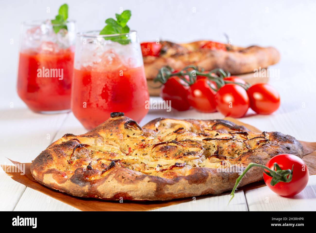 Italian flat bread (focaccia) with onions and herbs Stock Photo Alamy