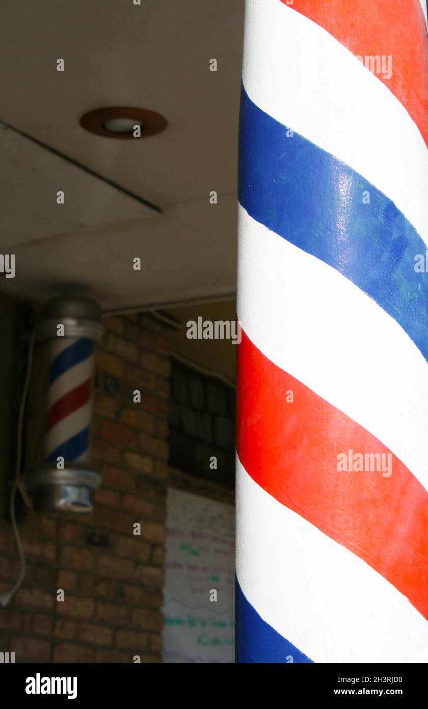 Barber Shop Signs in Small Texas Town Stock Photo