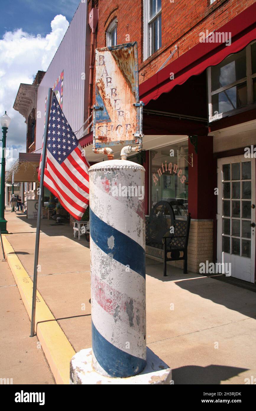 Barber Shop Signs in Small Texas Town Stock Photo