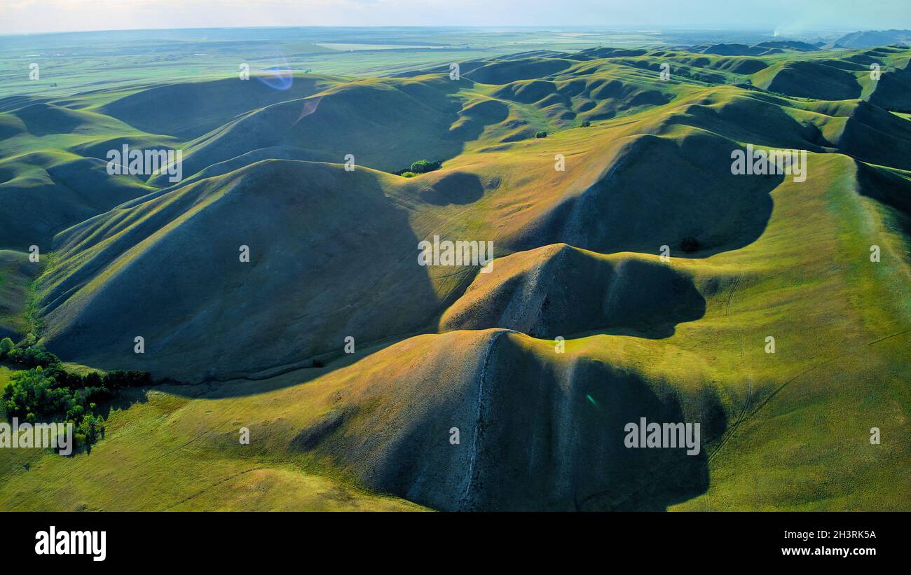 Aerial View of the Long Mountains Ridge. The beginning of the Ural mountains. Orenburg region. Stock Photo