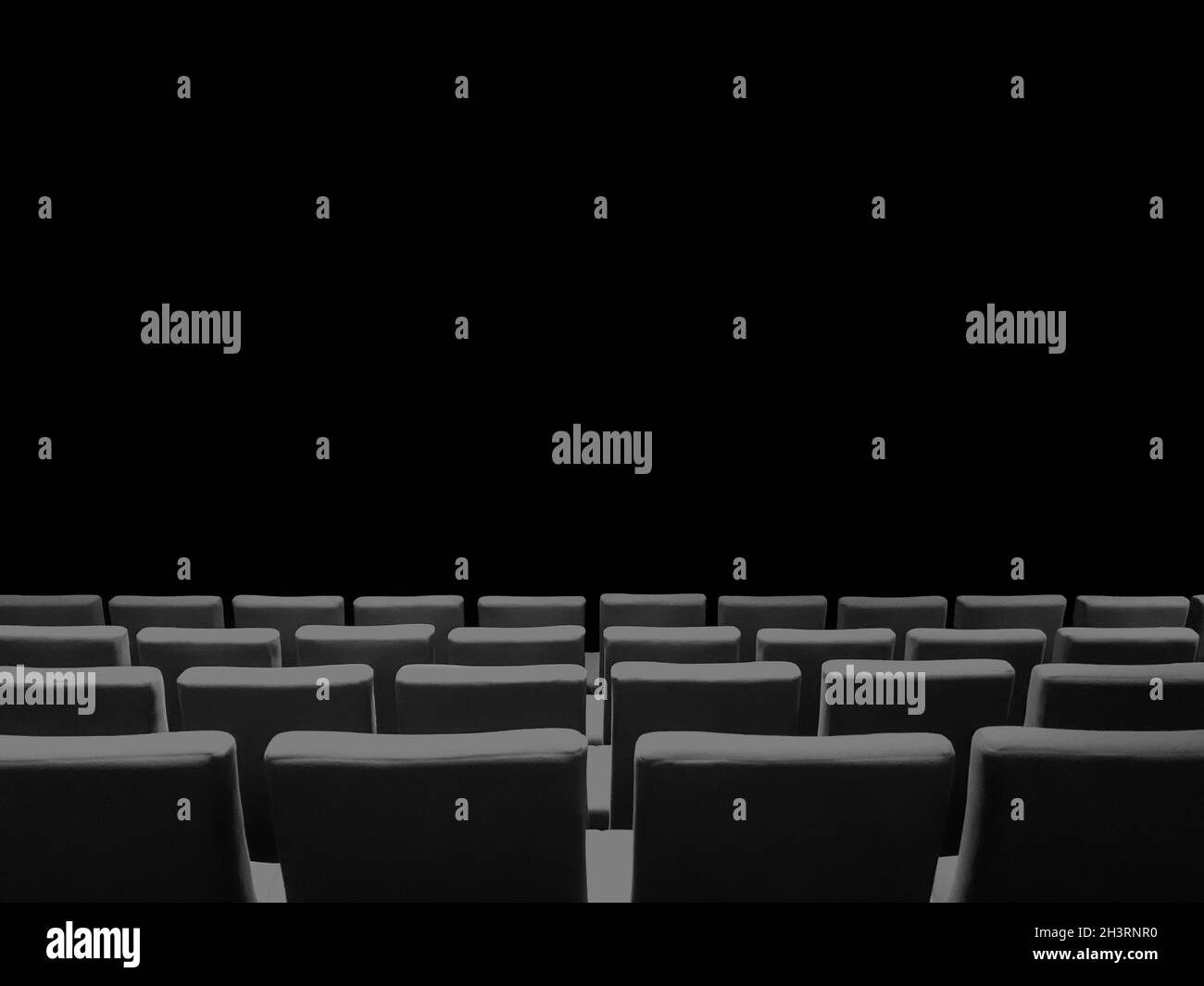 Cinema movie theatre with seats rows and a black background Stock Photo