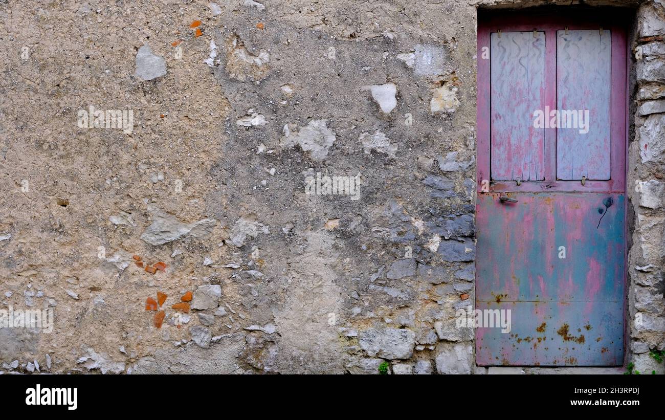 ancient pink and blue door with old wall. House entrance Stock Photo ...