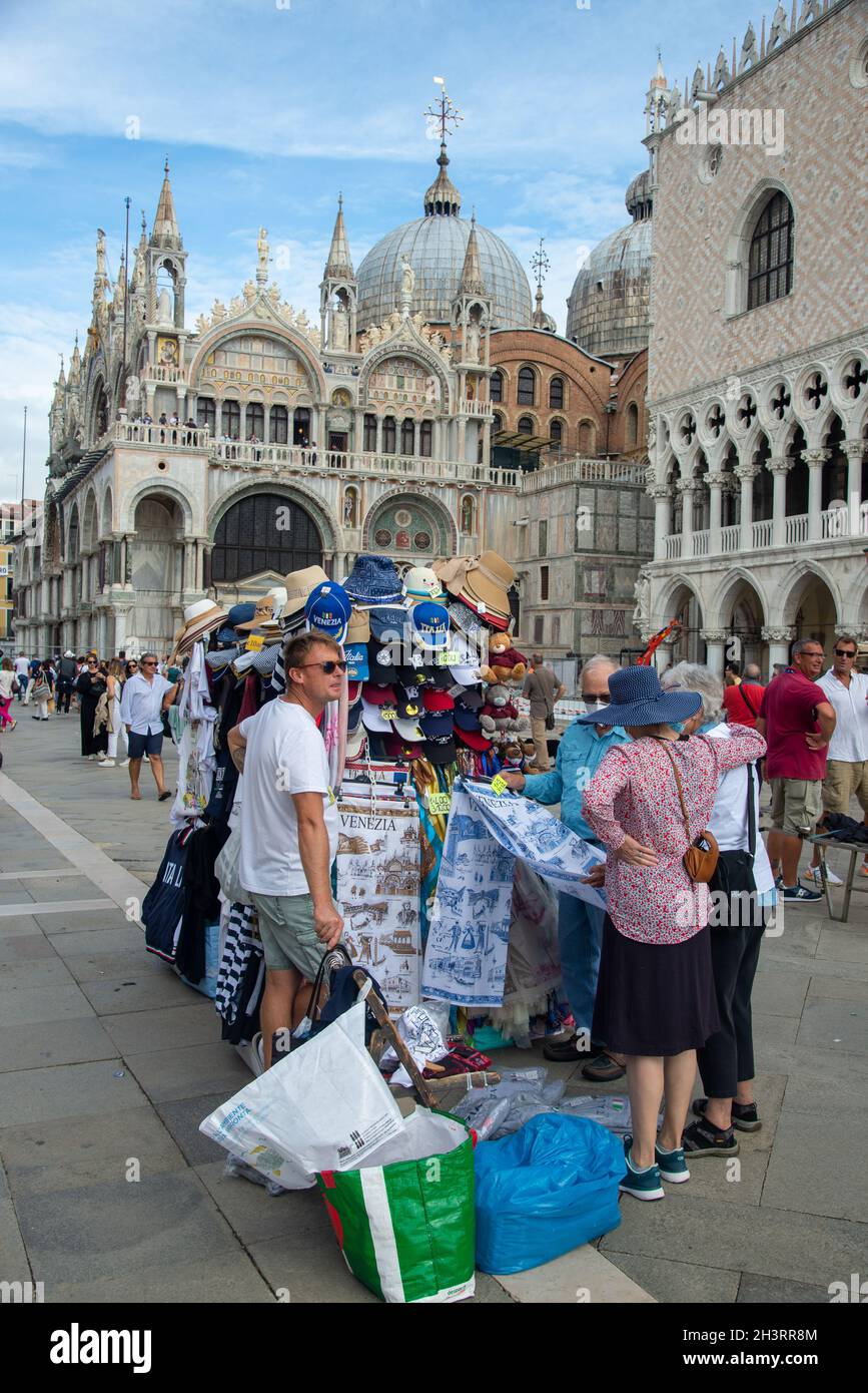 souvenir shops and Palazzo Ducale at San Marco square in Venice, Italy