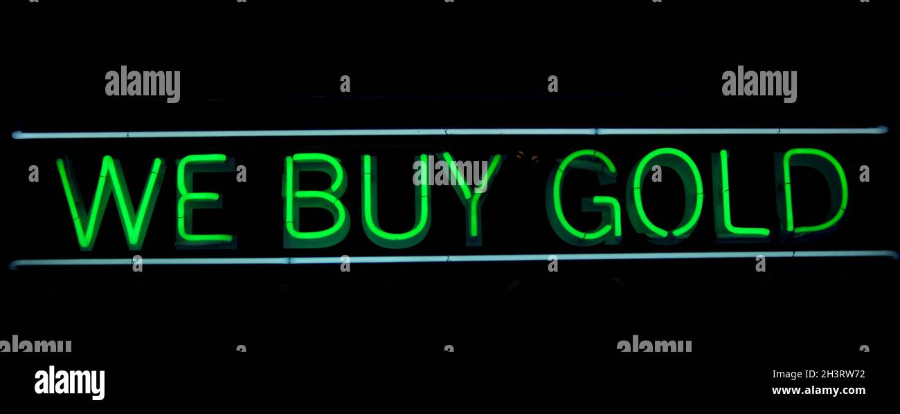 Vintage Neon Sign in Window of Pawn Shop Stock Photo