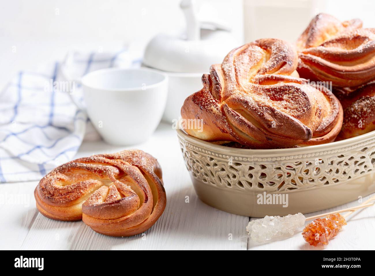 Swirling buns sprinkled with sugar. Stock Photo