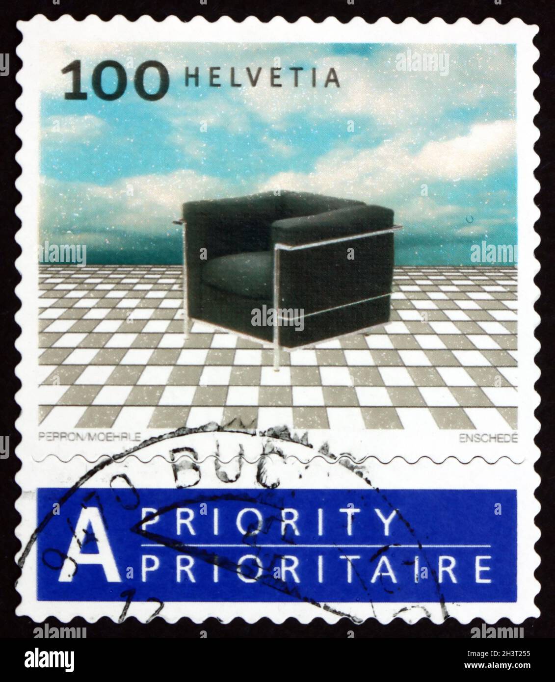 SWITZERLAND - CIRCA 2003: a stamp printed in Switzerland shows black armchair (Le Fauteuil Grand Confort) from 1928, designed by Le Corbusier, circa 2 Stock Photo