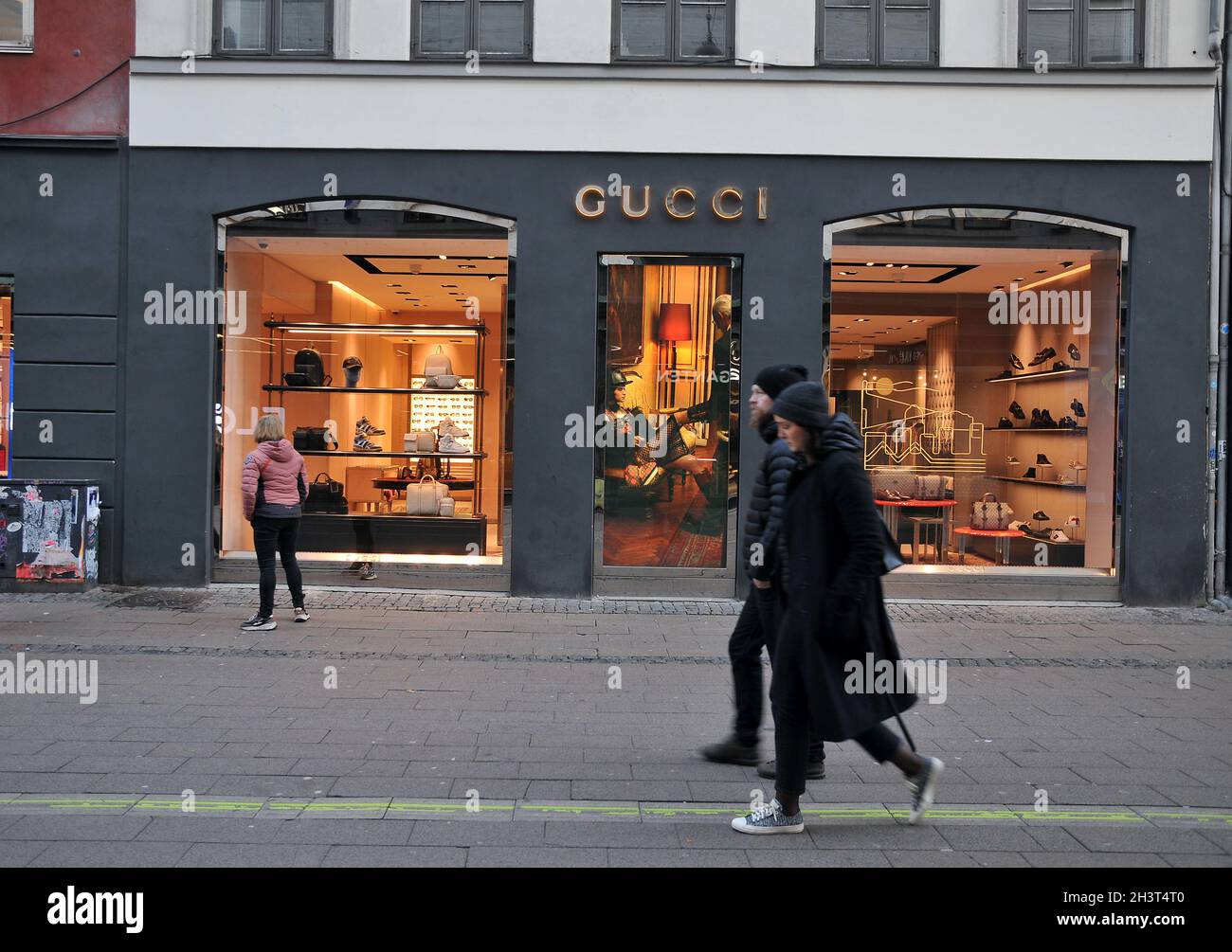 Copenhagen /Denmark / 30 October 2021 / are shopprs walk by Gucci store on stroeget in danish capital. (Photo. FRRcis Joseph Dean/Dean Pictures Stock Photo - Alamy