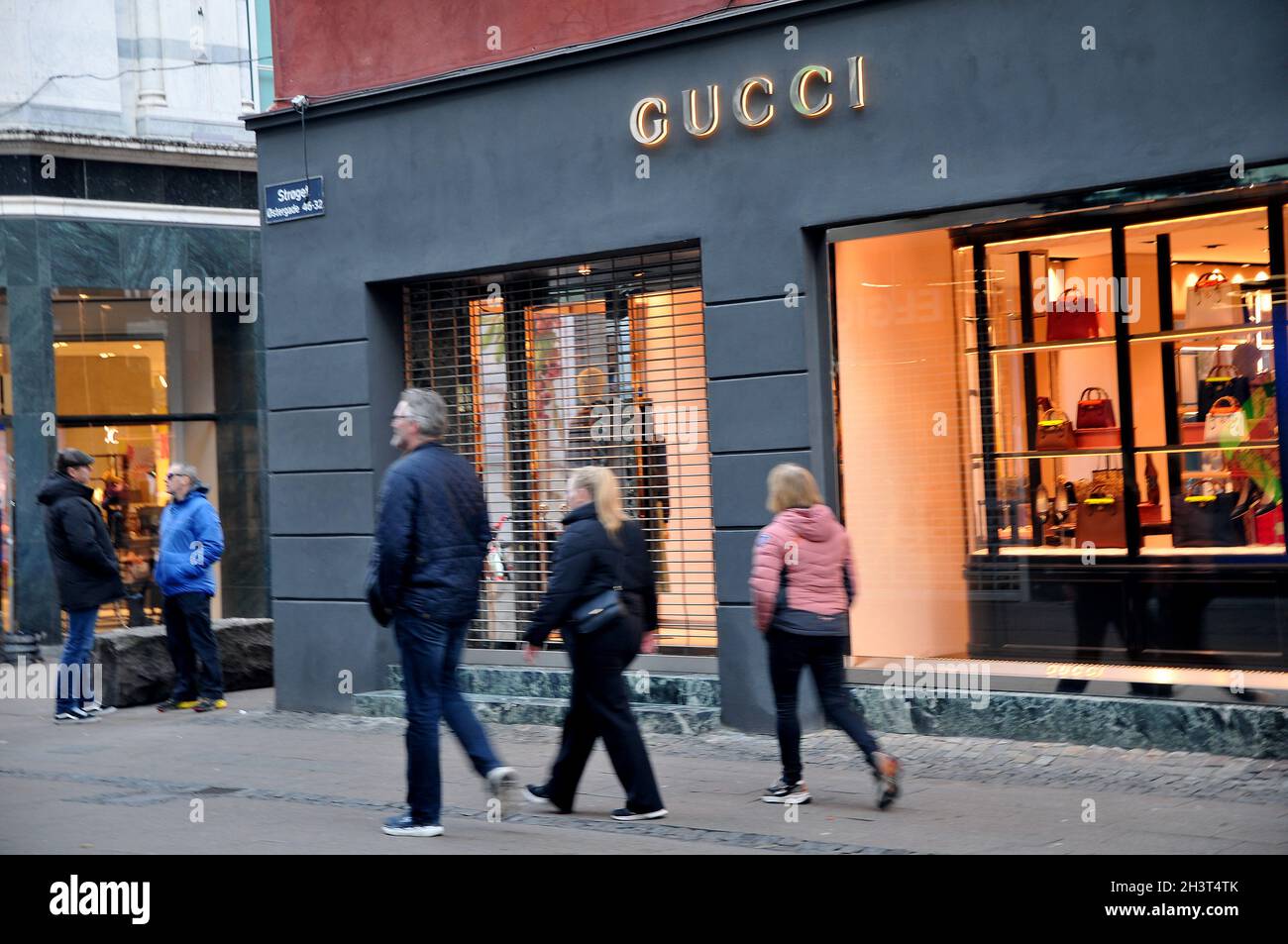 Copenhagen /Denmark / 30 October 2021 / Tourists are shopprs walk by Gucci  store on stroeget in danish capital. (Photo. FRRcis Joseph Dean/Dean  Pictures Stock Photo - Alamy