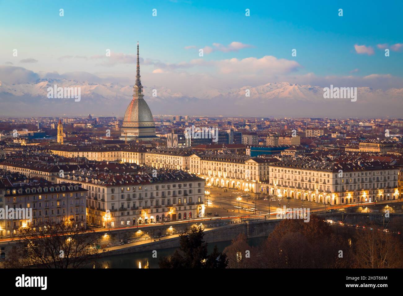 Turin, Italy. Panorama from Monte dei Cappuccini (Cappuccini's Hill) at sunset with Alps mountains and Mole Antonelliana Stock Photo