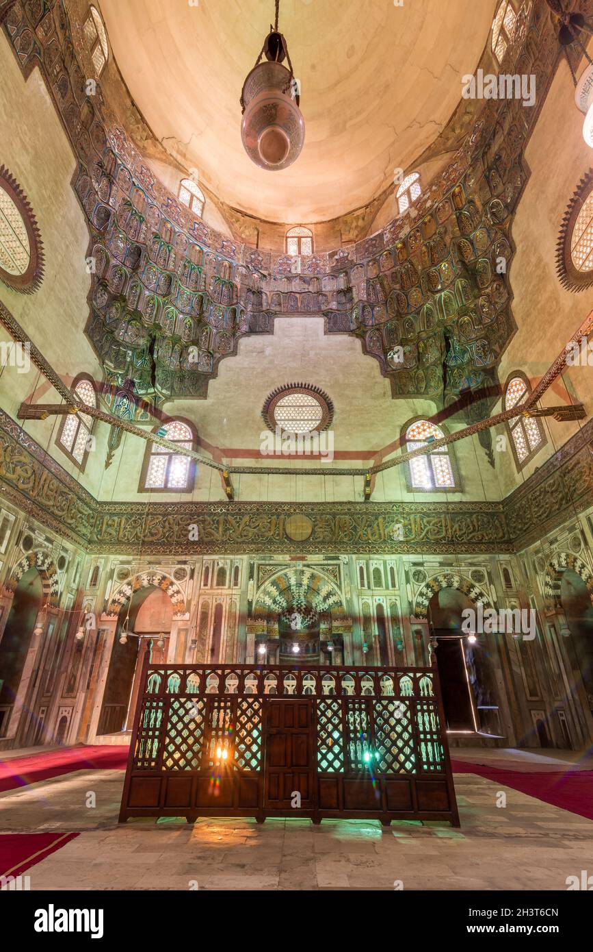 Cenotaph mediating mausoleum chamber at Mamluk era historical Mosque and Madrasa of Sultan Hassan with multicolored marble mosaic, and carved inscription of the Throne Verse, Cairo, Egypt Stock Photo