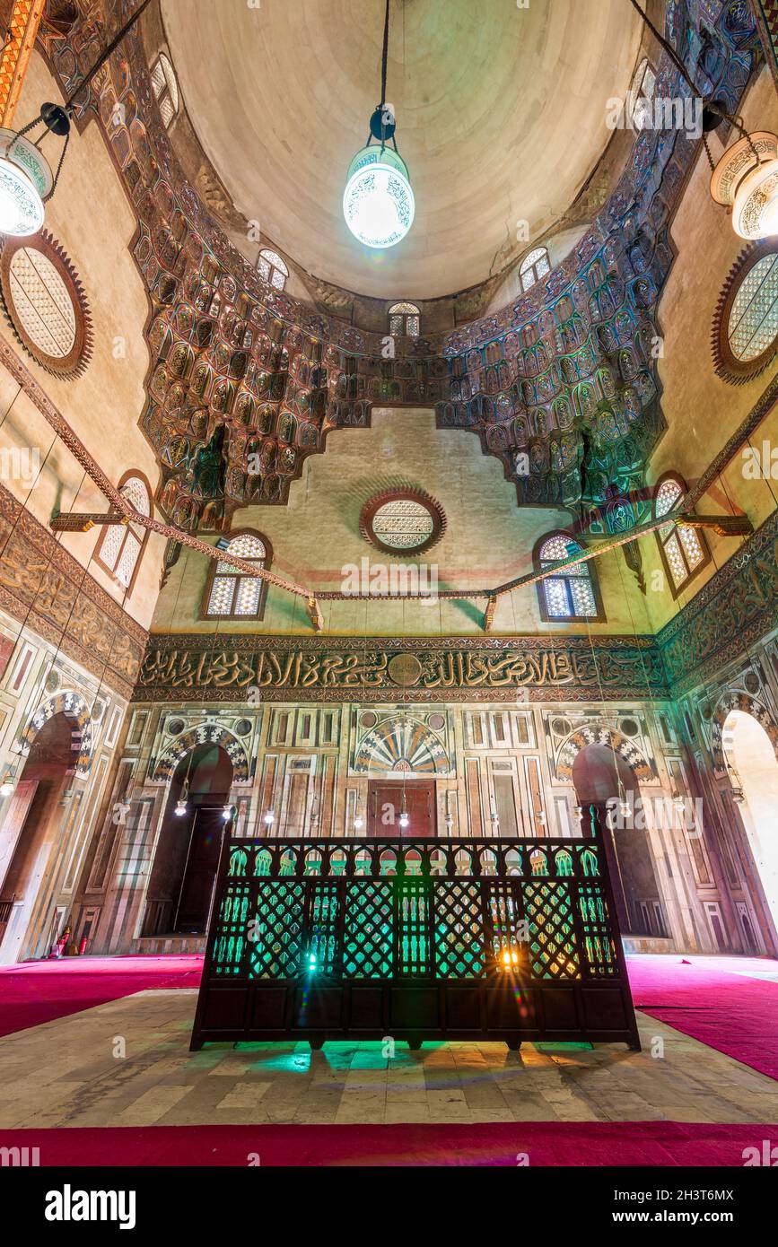 Cenotaph mediating mausoleum chamber at Mamluk era historical Mosque and Madrasa of Sultan Hassan with multicolored marble mosaic, and carved inscription of the Throne Verse, Cairo, Egypt Stock Photo