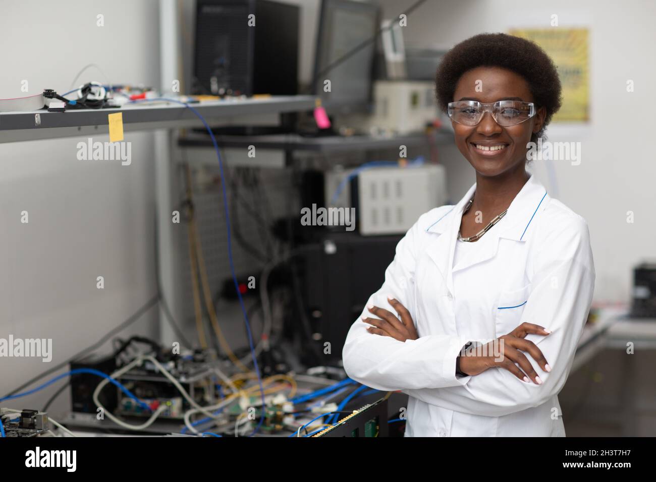 Scientist african american woman working in laboratory with electronic ...