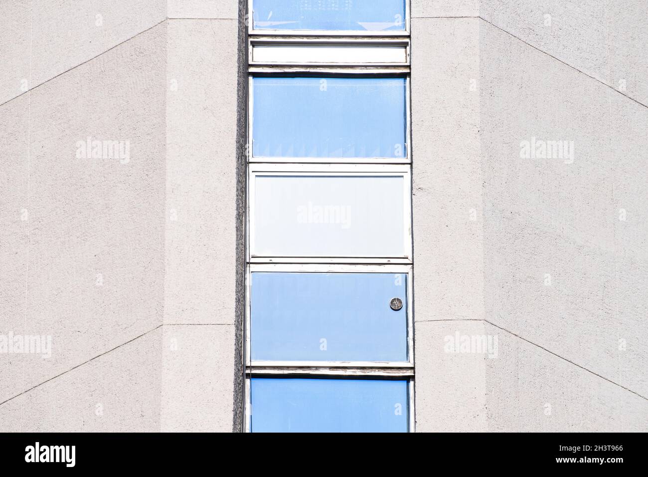 Abstract architectural detail of a concrete office building window ...