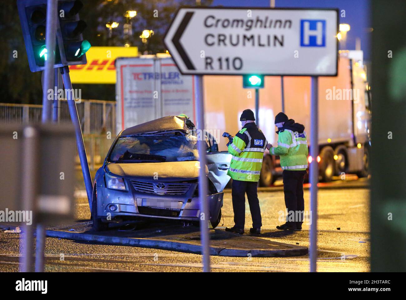 NUMBERPLATE PIXELATED BY PA PICTURE DESK Gardai at the scene in Dublin ...