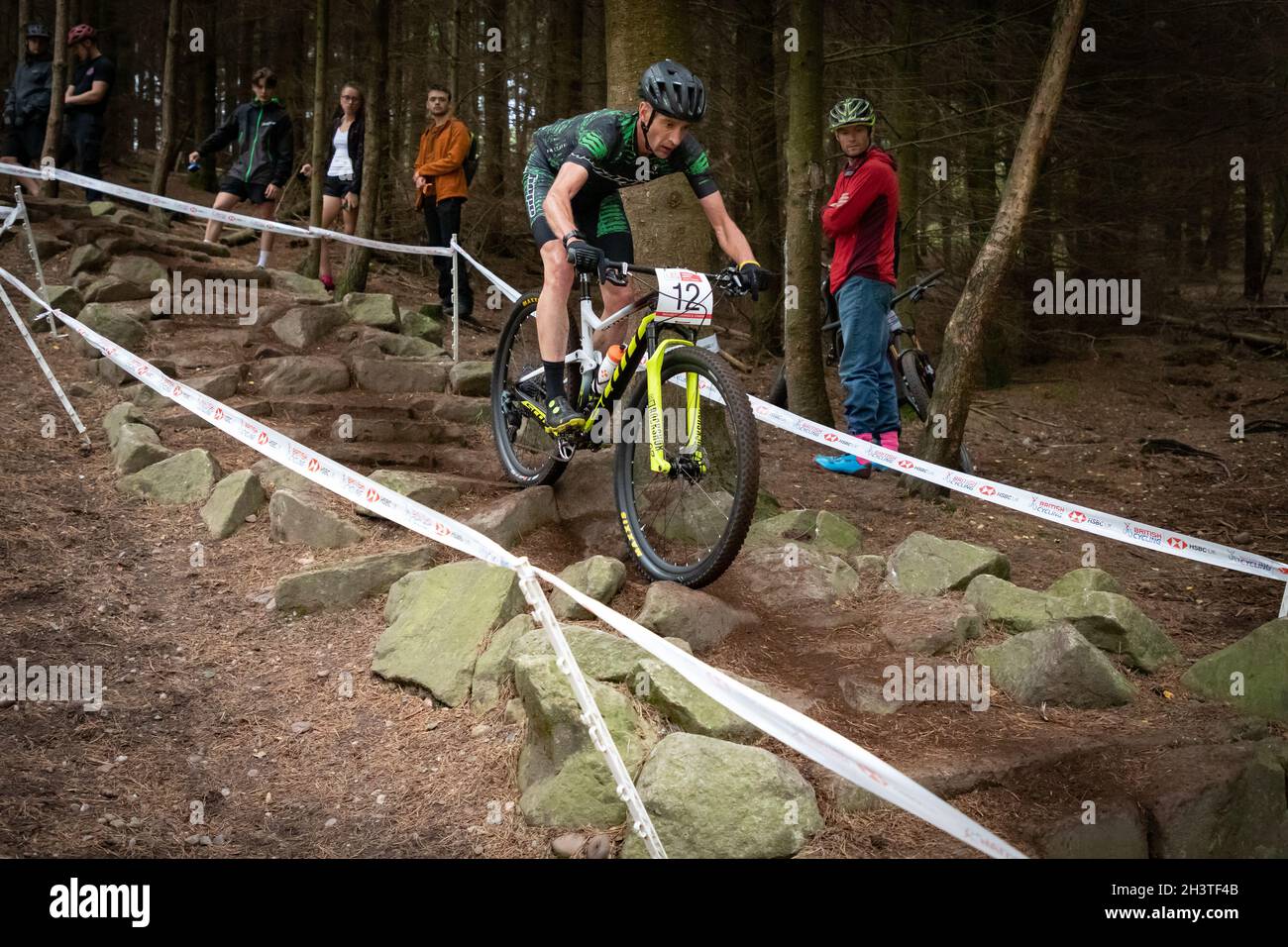 Mountain bike racers in national points series race, Cannock Chase, Staffordshire, England, UK, GB, Europe. Stock Photo