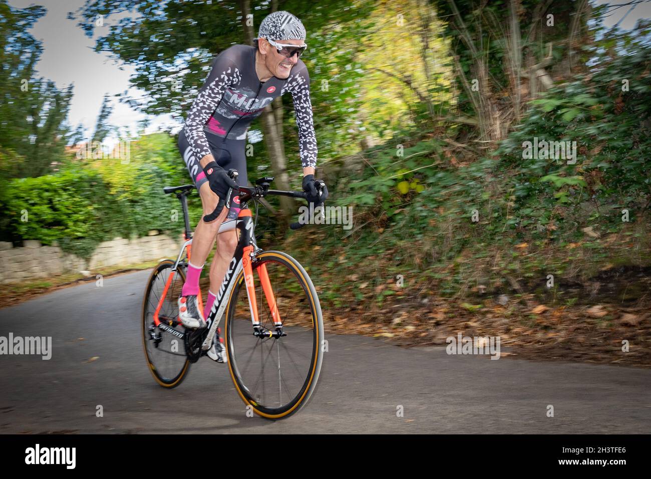 Road cyclist competing in Hill Climb Race, Prospect Hill, Corbridge, Northumberland. Stock Photo