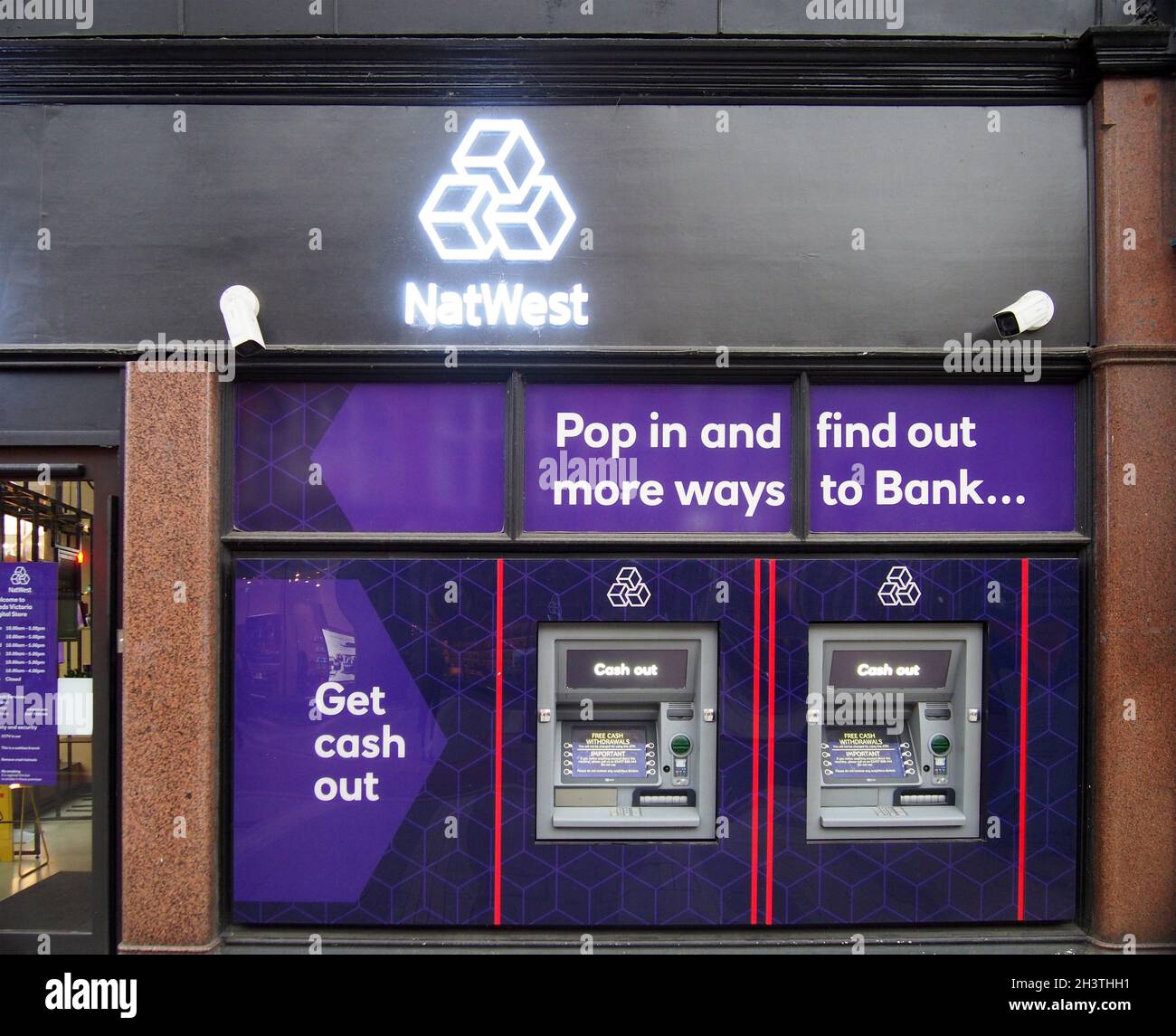 Branch of a natwest bank and with cash machines on park row in leeds
