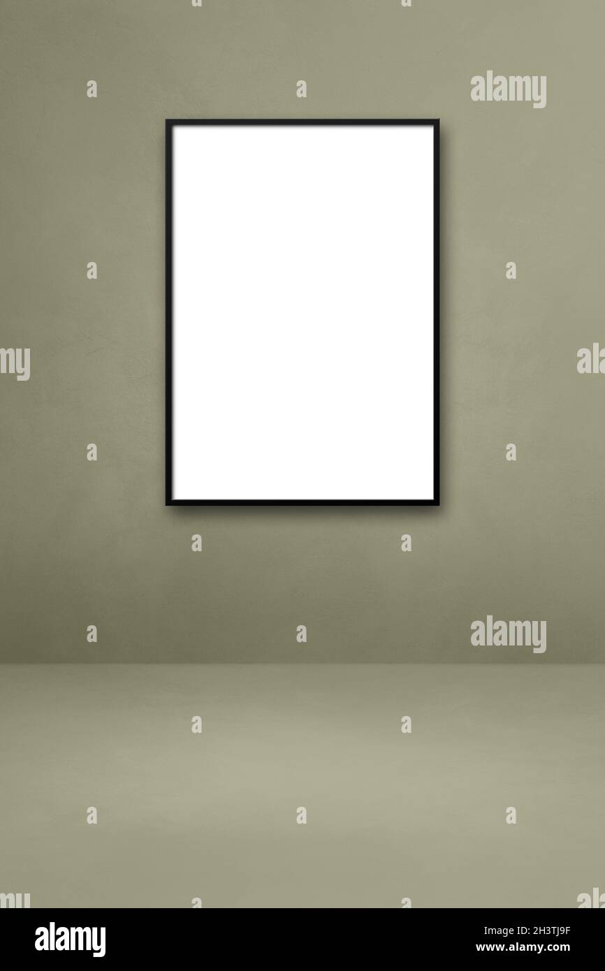 Black picture frame hanging on a grey wall Stock Photo - Alamy