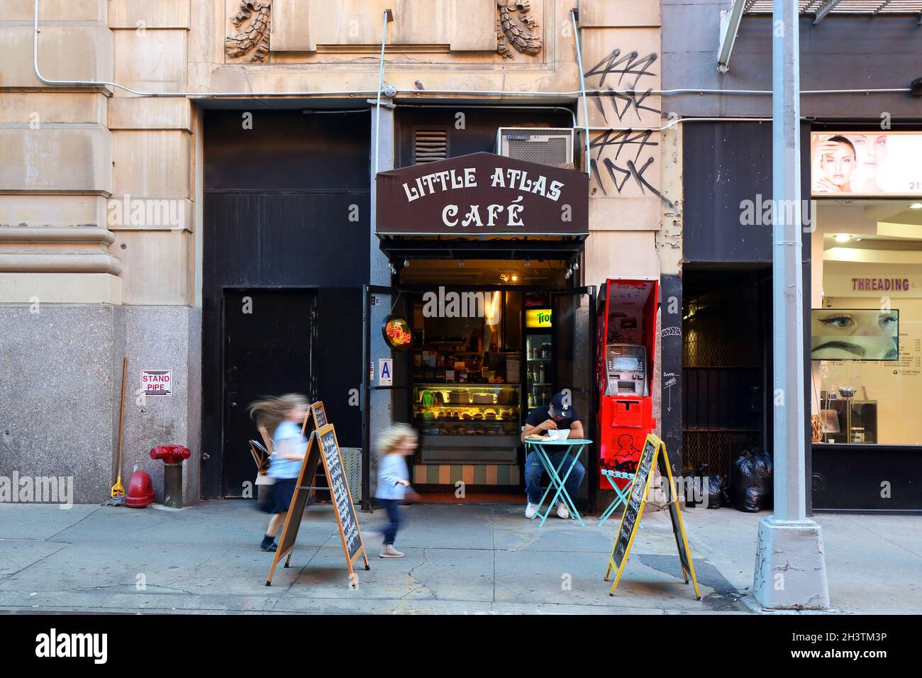 Little Atlas Cafe, 6 West 4th Street, New York, NYC storefront photo of a tiny cafe and eatery near New York University. Stock Photo