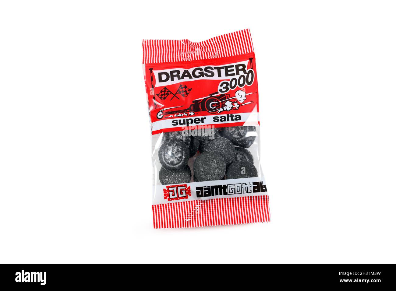 A bag of Jämtgott brand Dragster 3000 Swedish salty licorice candy isolated on a white background. licorice coated with ammonium chloride. Stock Photo
