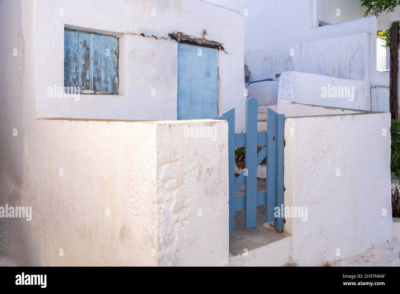 Folegandros island, Greece, Cyclades. Small white house with blue door ...