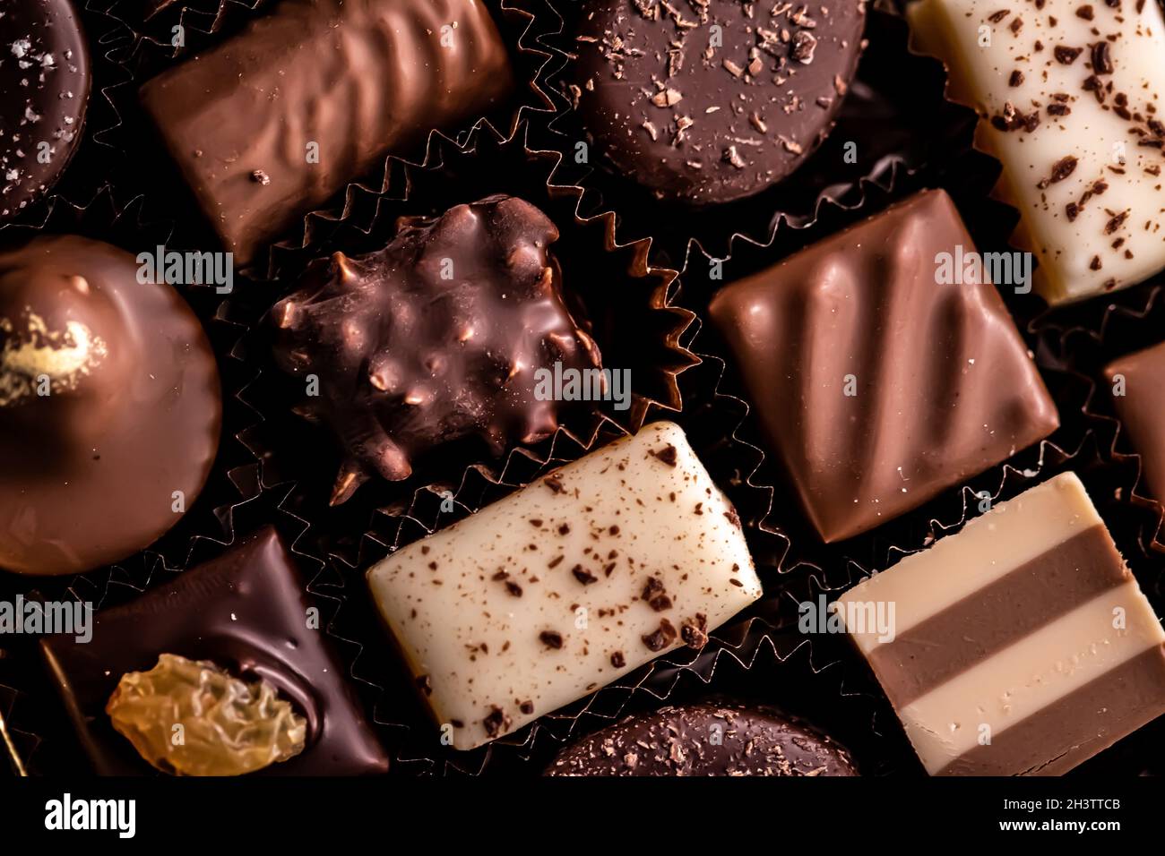 Swiss chocolates in gift box, various luxury pralines made of dark and milk  organic chocolate in chocolaterie in Switzerland, sw Stock Photo - Alamy