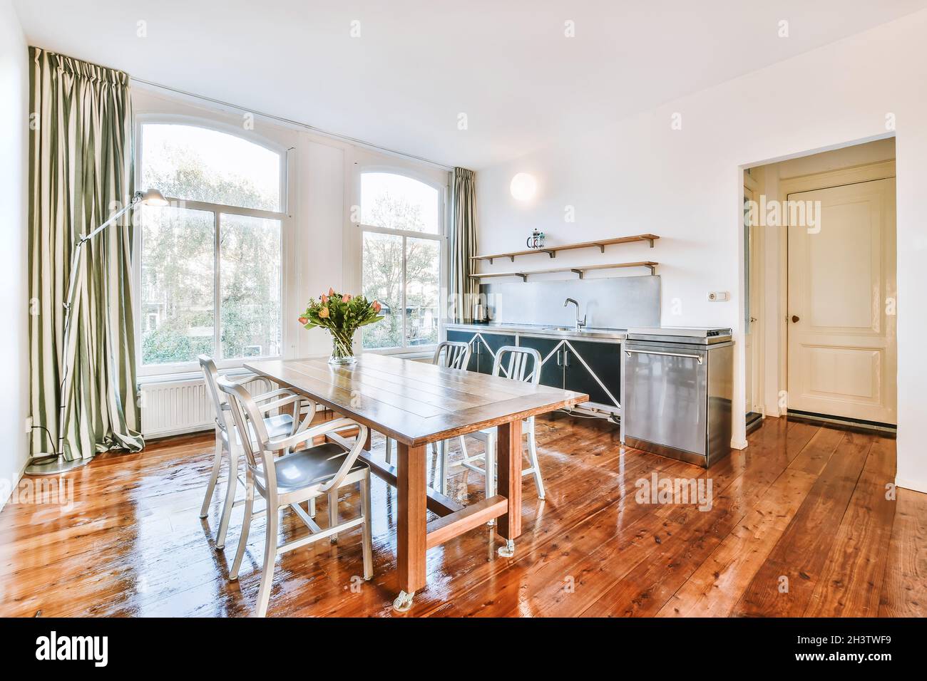 Modern dining room in a luxury house with individual design Stock Photo ...