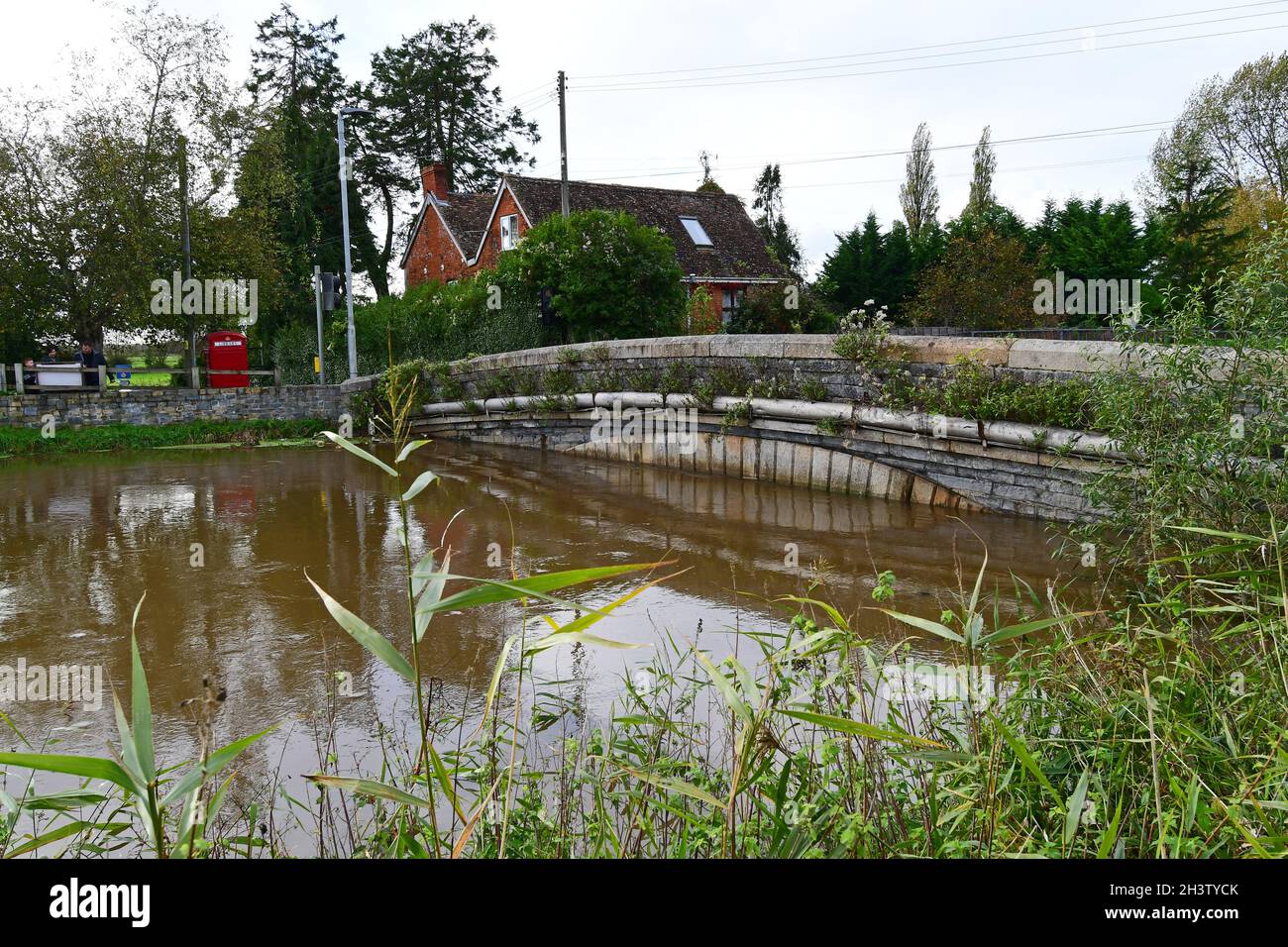 Glastonbury, UK. 30th Oct, 2021. On a mild afternoon after Very Heavy overnight Storms, Burrowbridge road bridge which crosses the fast flowing River Parrett is seen at a dangeriously high level, witch reaches the top of the underside of bridge. Picture Credit: Robert Timoney/Alamy Live News Stock Photo