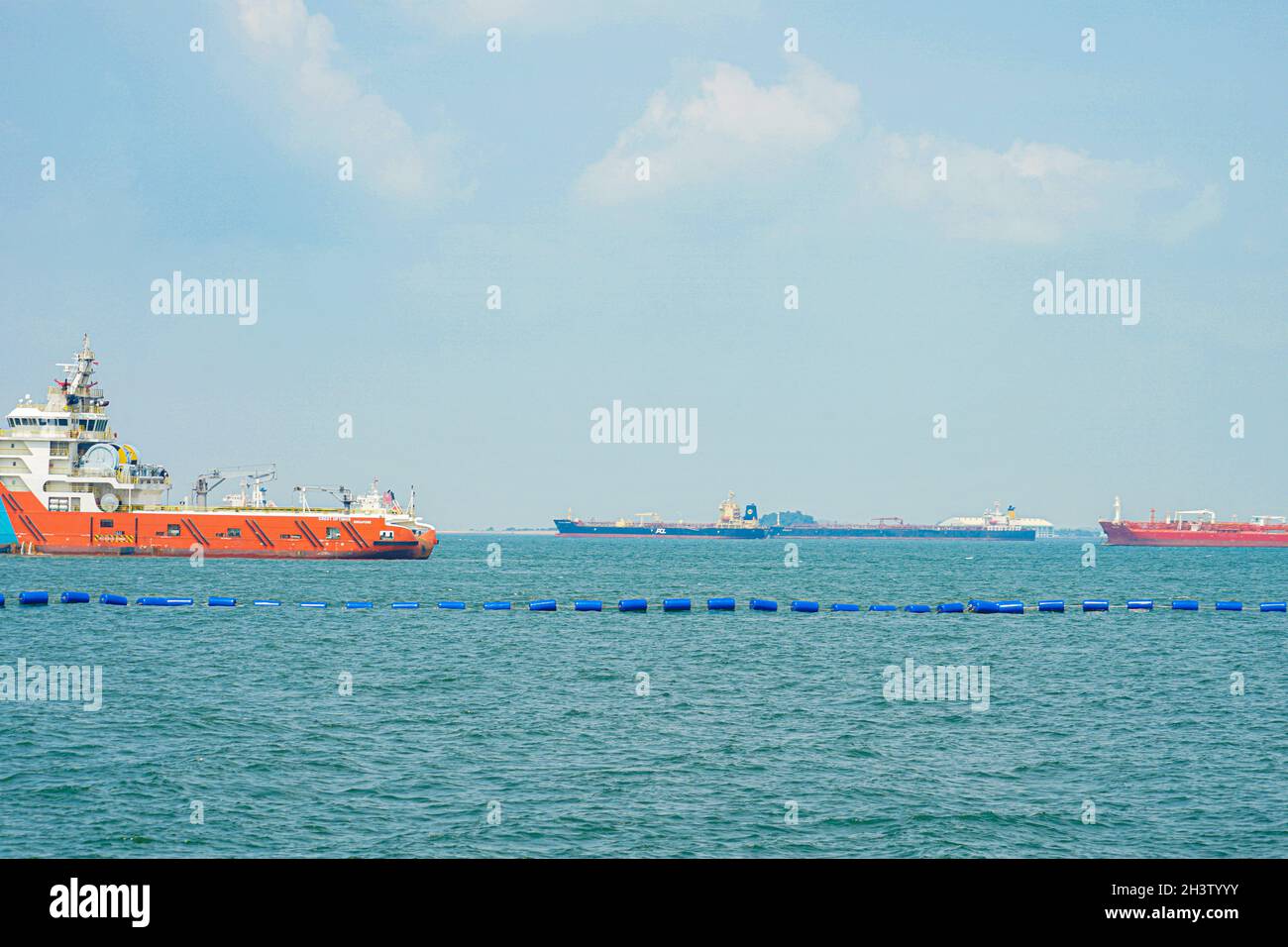 Singapore of the sea and the ship Stock Photo