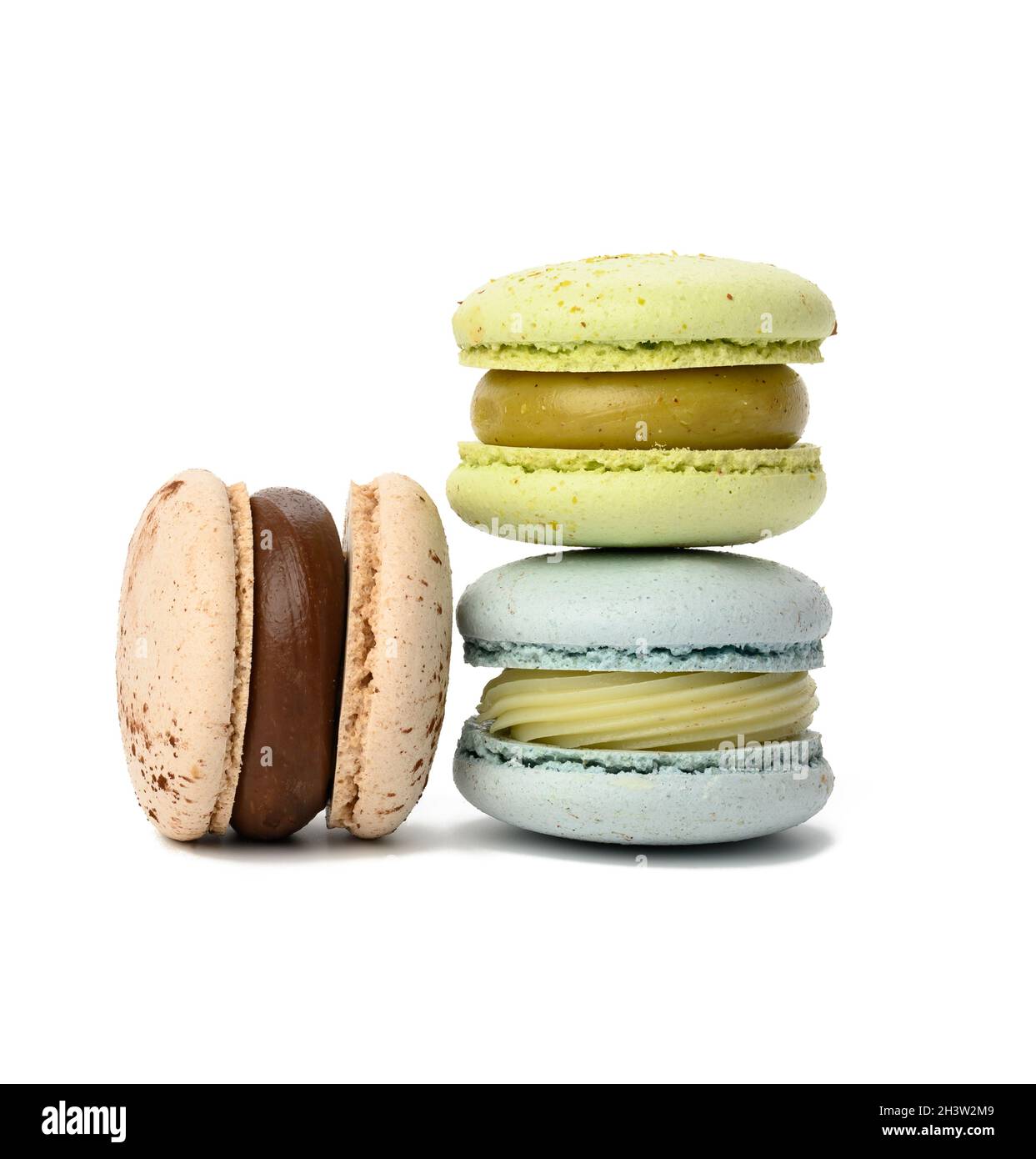 Baked round multicolored macarons on white background Stock Photo - Alamy