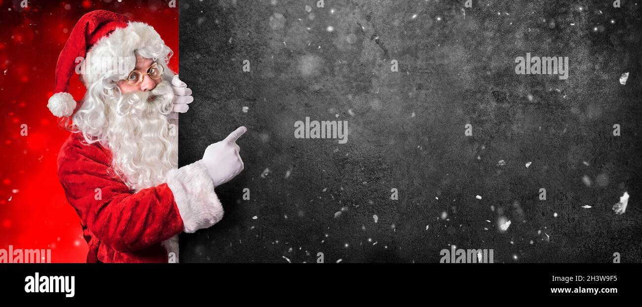 Black Friday Sale - Santa Claus Pointing Promotion Banner Stock Photo