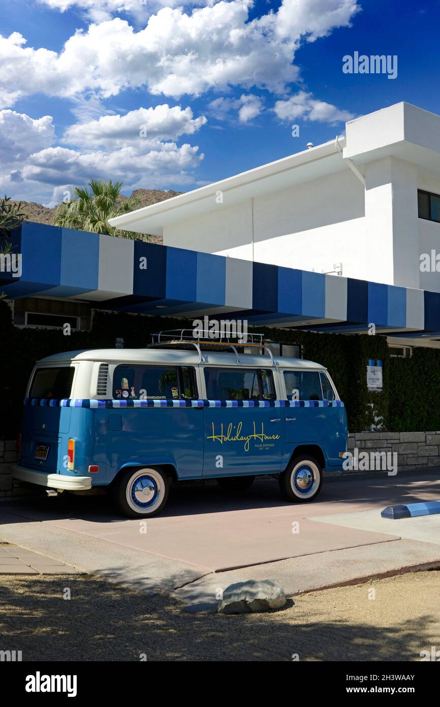 1960s blue painted VW Camper van with white-wall tyres and Holiday House graphics in Palm Springs CA Stock Photo
