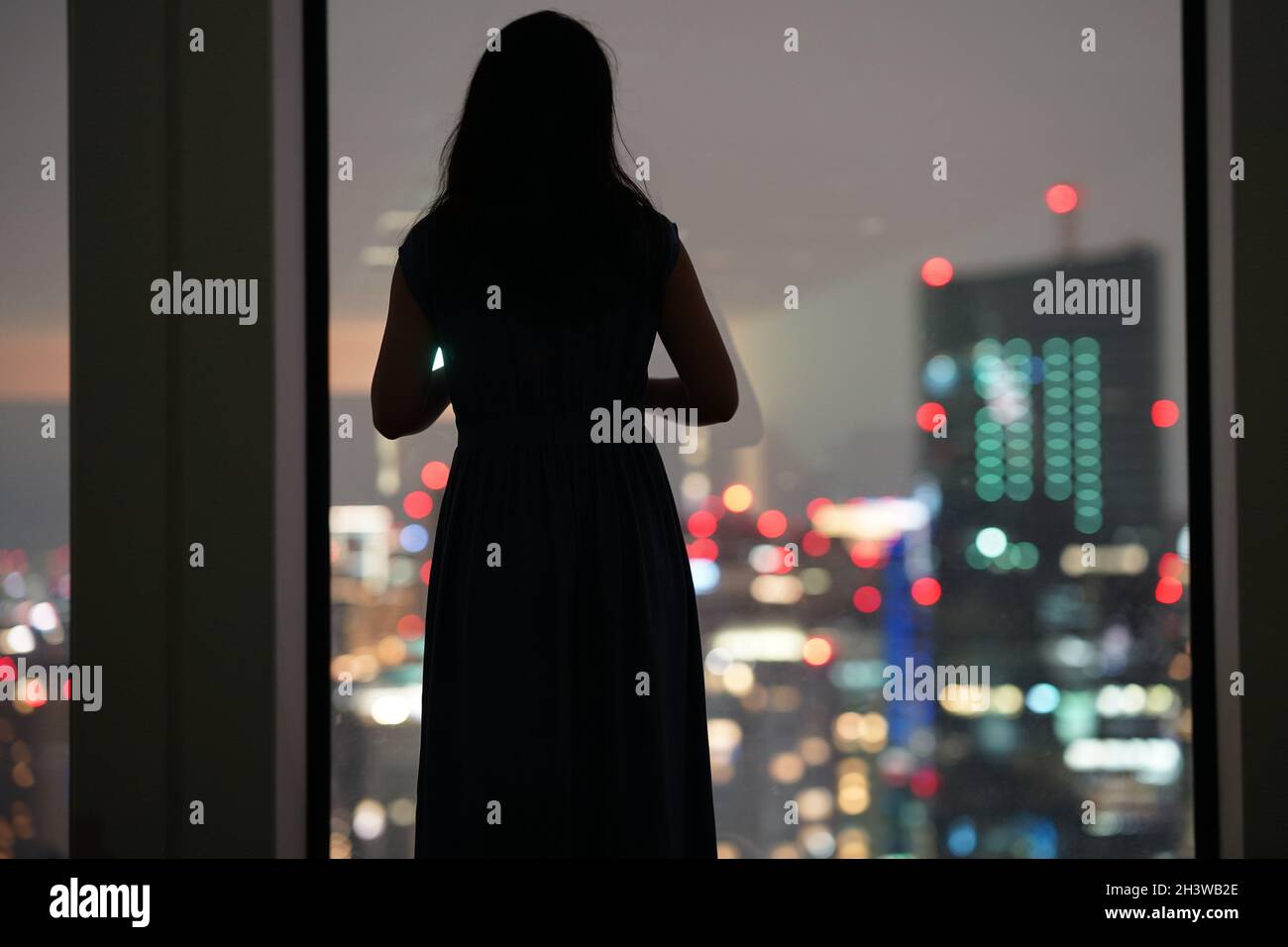 Night view and female silhouette Stock Photo