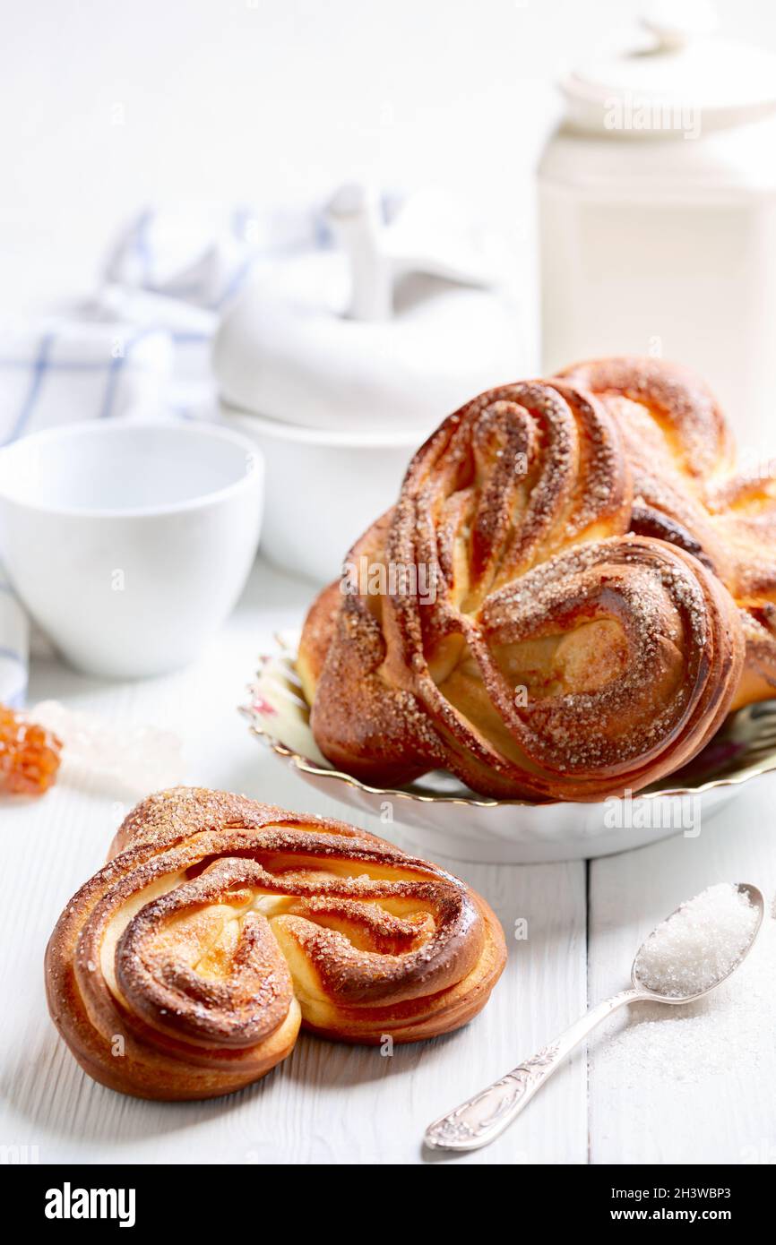 Swirling buns sprinkled with sugar. Stock Photo