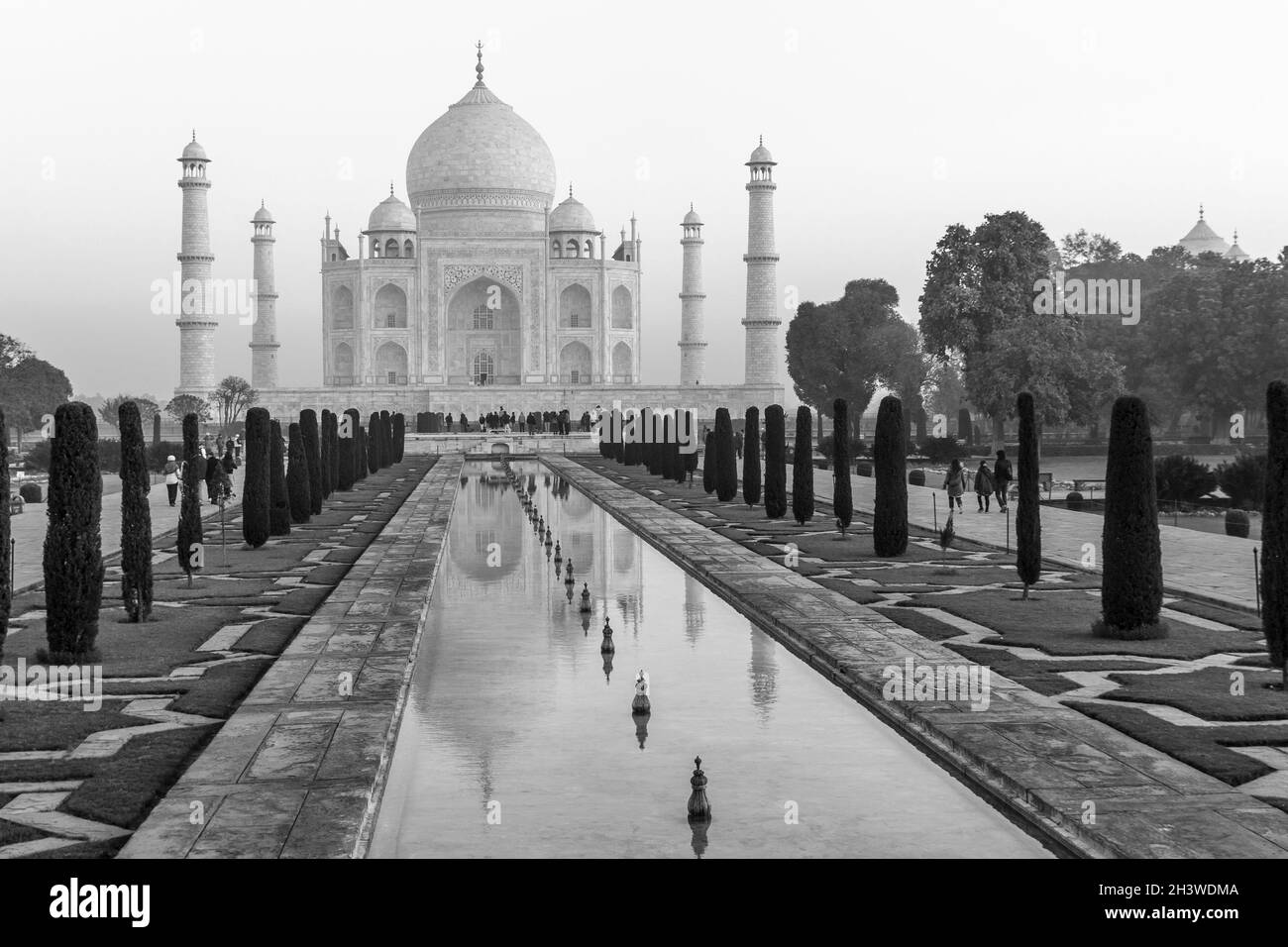 Taj Mahal and its reflection. The classic view in BnW. Stock Photo