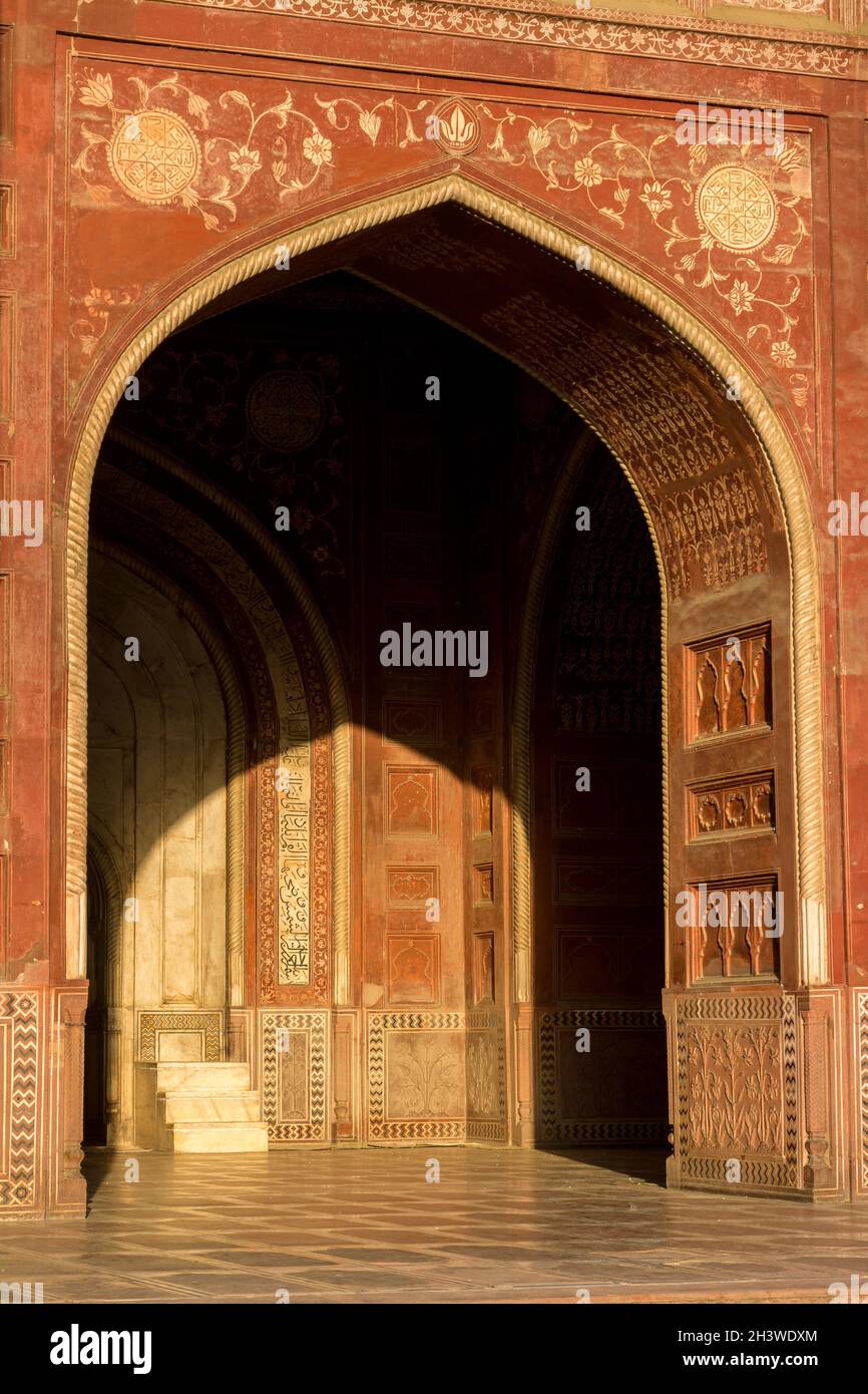 Portal and the interior of the mosque located in the Taj Mahal complex Stock Photo