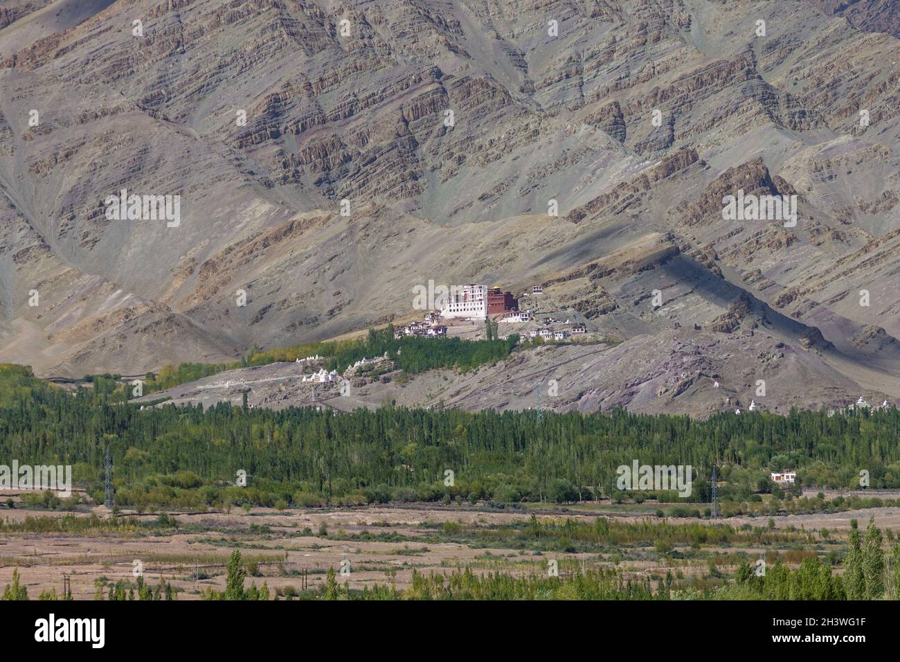 Matho Monastery with the sedimentary rocks of Zanskar Mountains in the background Stock Photo