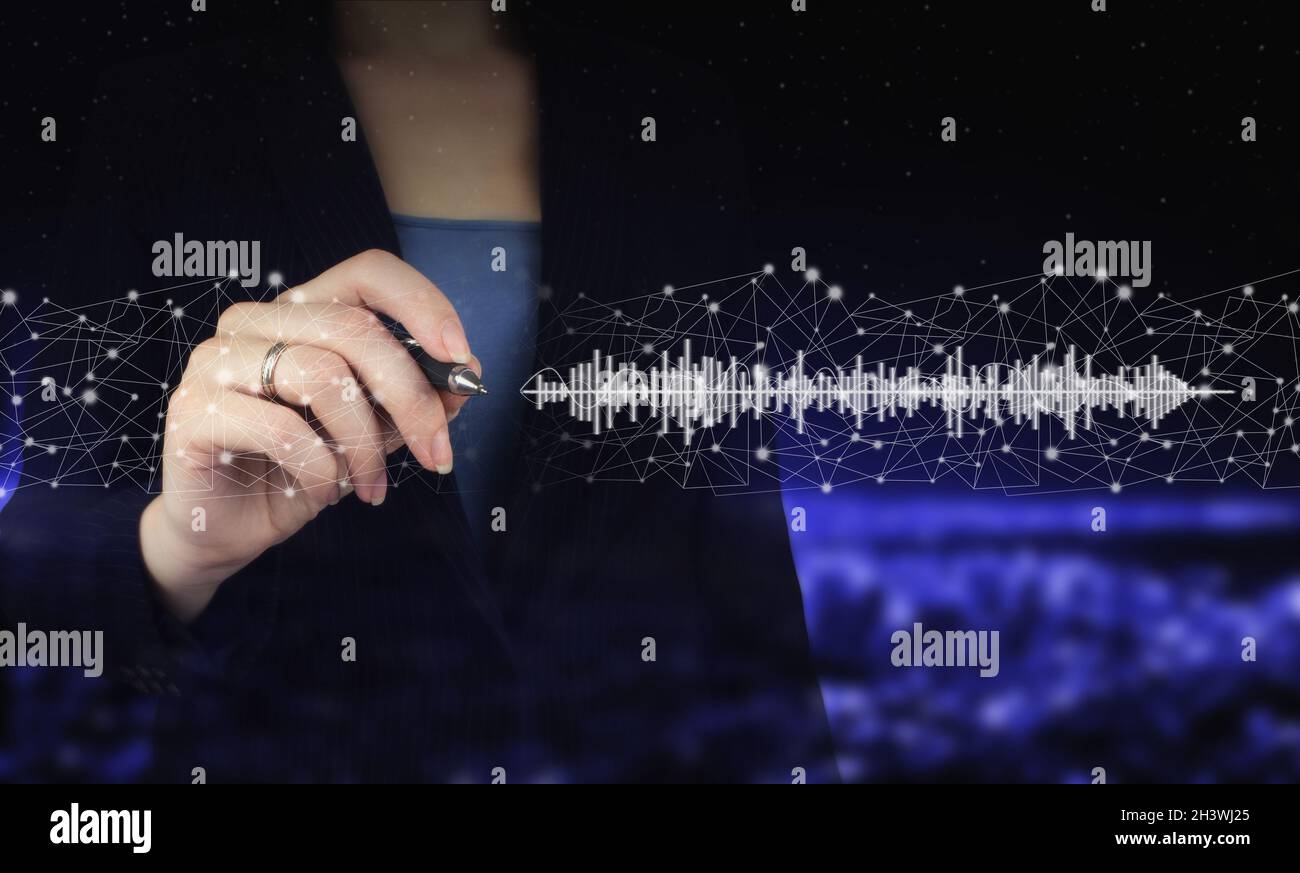 Listening to music on mobile devices. Voice recognition. Hand holding digital graphic pen and drawing digital hologram sound track, wave sign on city Stock Photo