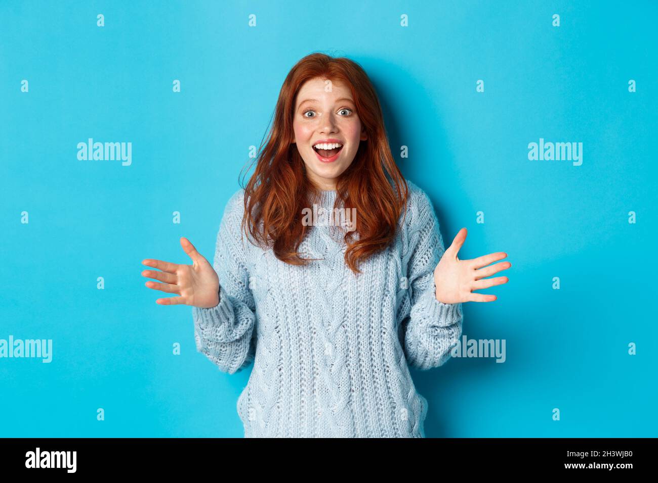 Excited Redhead Woman Shaking Hands Explaining Big News Staring At