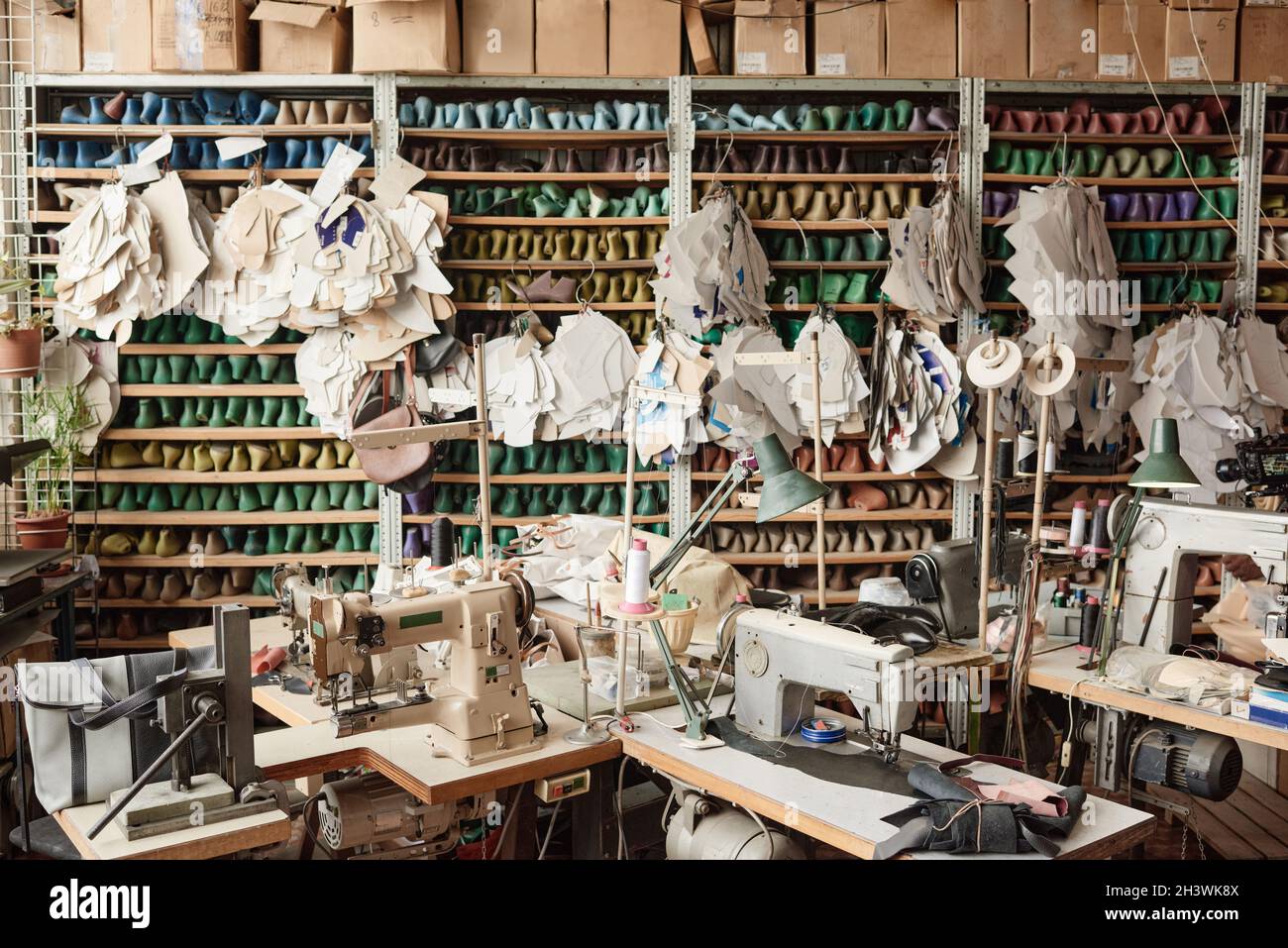Image of tailor studio with sewing equipments and patterns for tailors and shoemakers Stock Photo