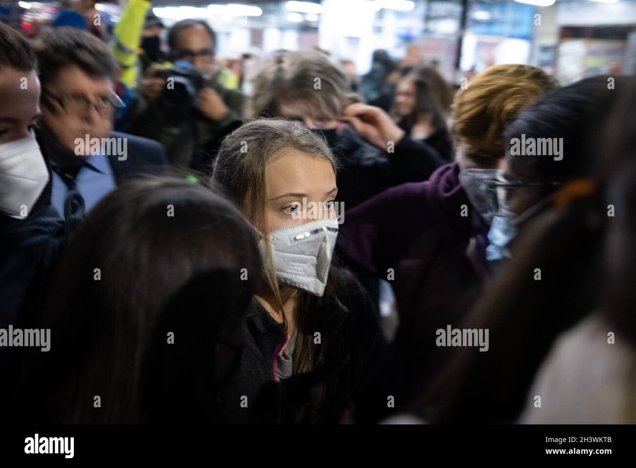 Glasgow, UK. Swedish climate activist Greta Thunberg arrives in the city, and is mobbed by press and fans, ahead of the 26th UN Climate Change Conference, known as COP26, in Glasgow, United Kingdom, on 30 October 2021. Photo credit: Jeremy Sutton-Hibbert/Alamy Live News. Stock Photo