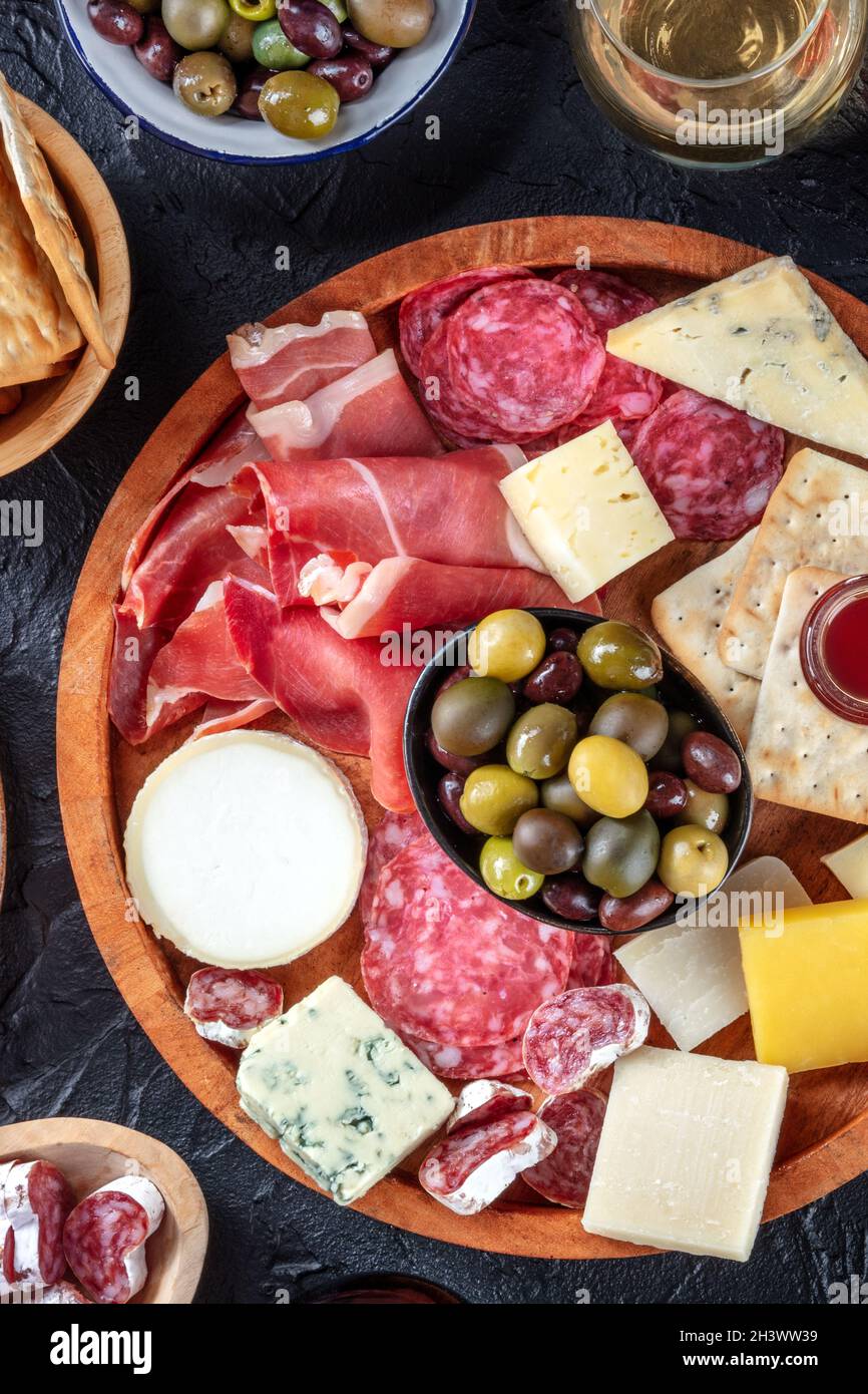 Italian antipasti or Spanish tapas with wine. Gourmet charcuterie and
