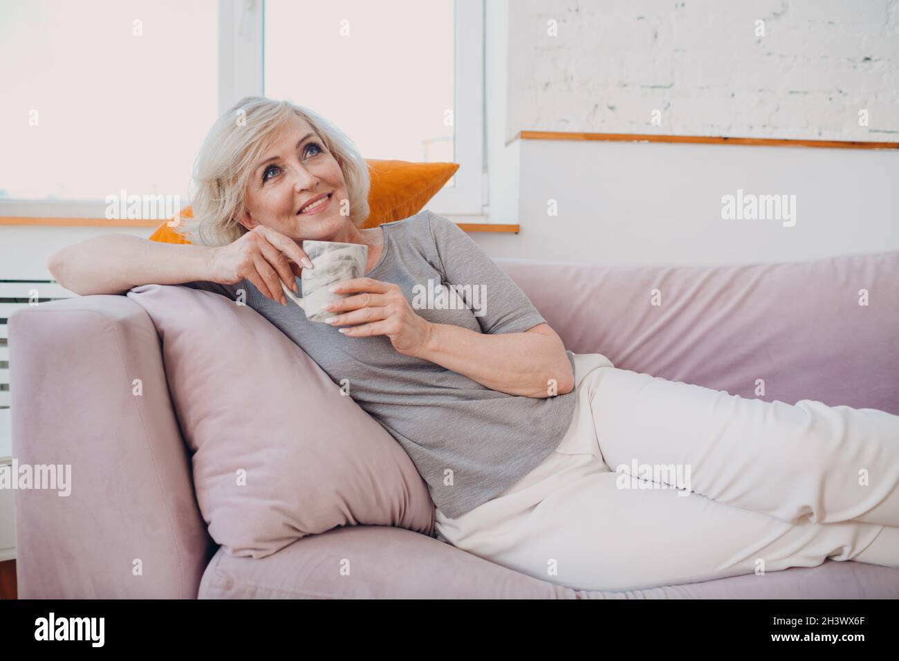 Elderly caucasian old aged woman enjoying afternoon tea at home Stock ...