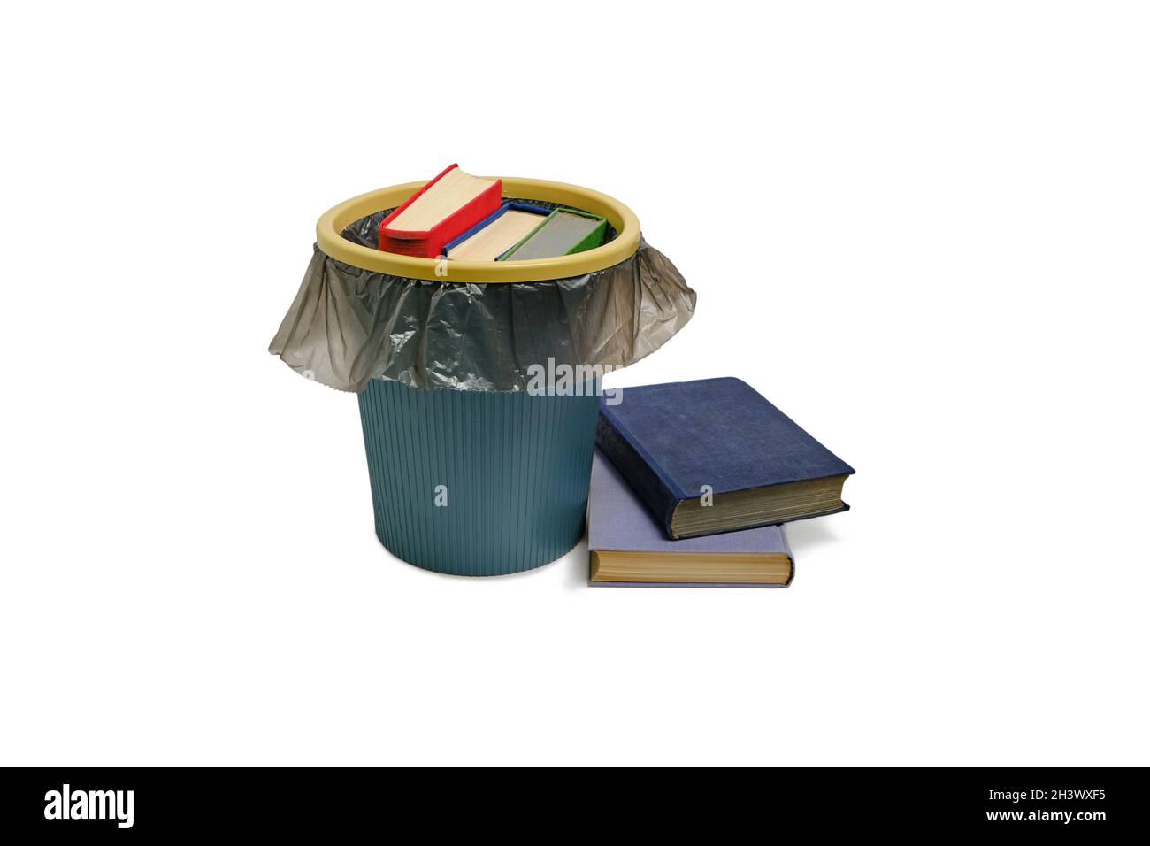 Trash can and the books thrown into it, on a white background, are ...