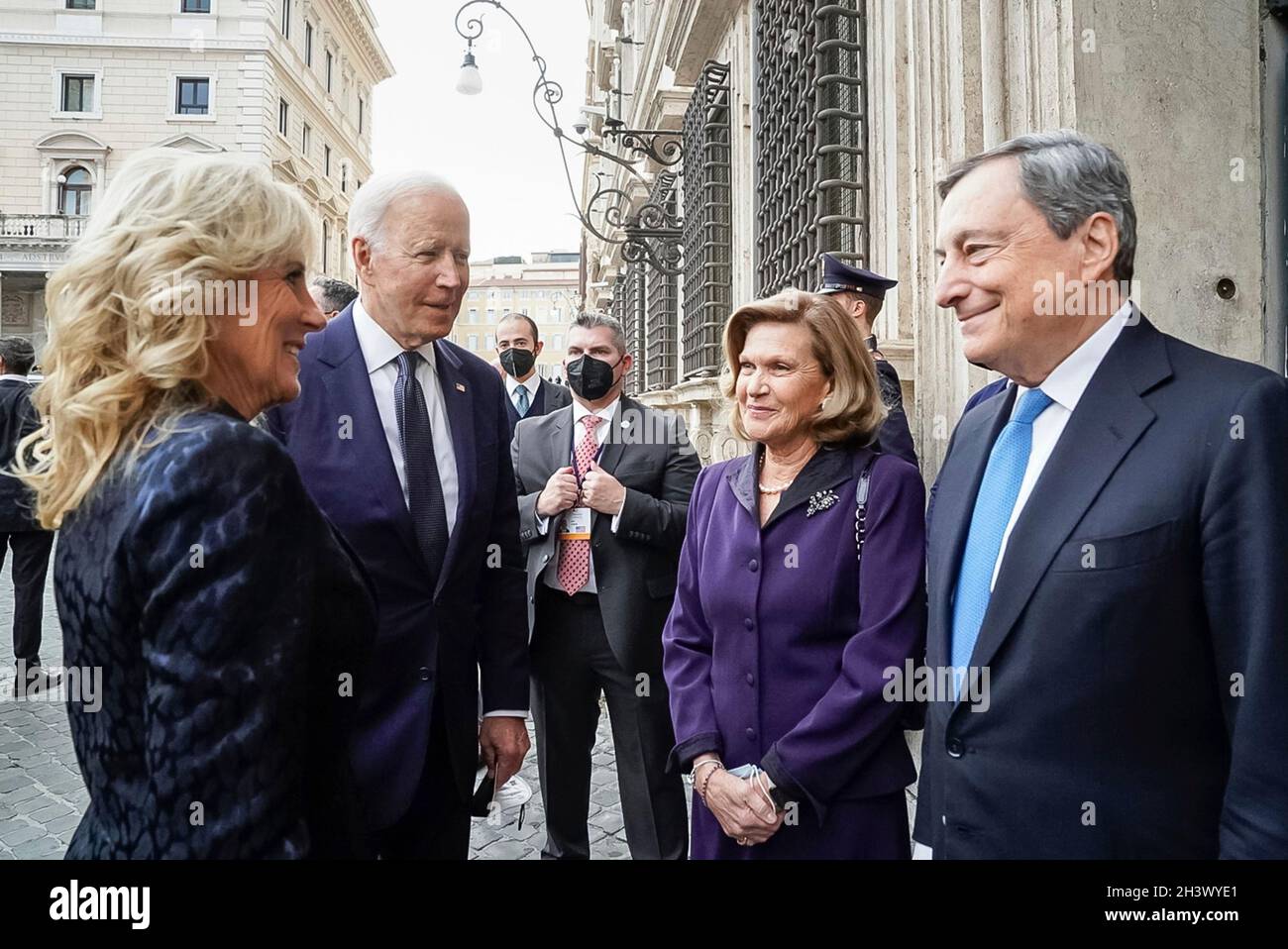 Rome, Italy. 29th Oct, 2021. U.S President Joe Biden and First Lady Jill Biden chat with Italian Prime Minister Mario Draghi, right, and his wife Maria Serenella Cappello, following meetings at the Palazzo Chigi October 29, 2021 in Vatican City, Vatican. Credit: Adam Schultz/White House Photo/Alamy Live News Stock Photo